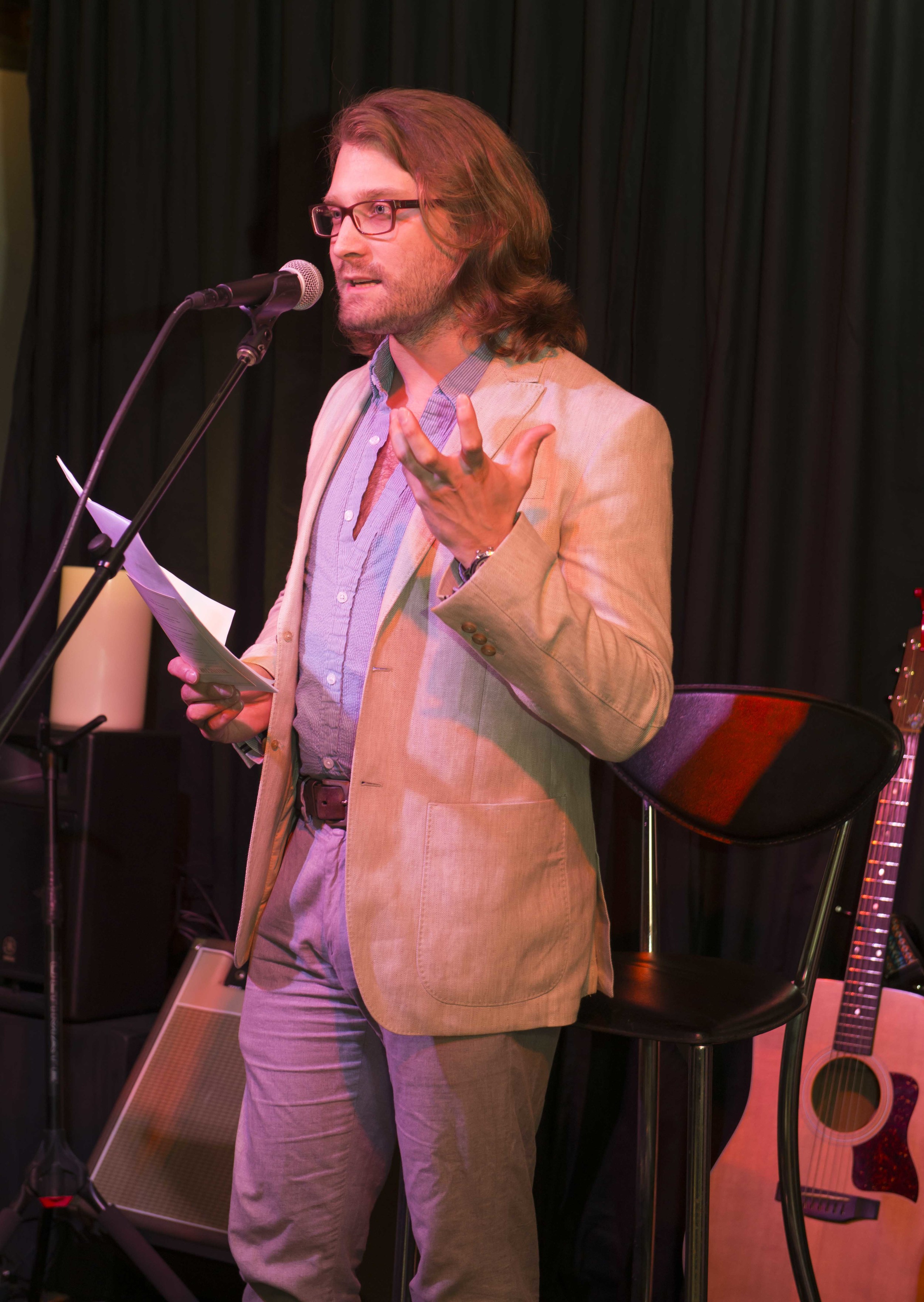Nathan Klose, poet and emcee (and semi-wild man), for the evening.