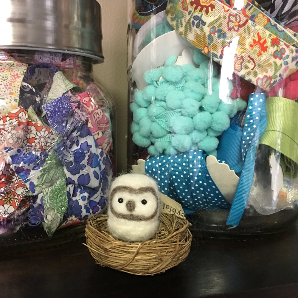 Felted owl with decorative ribbon jars