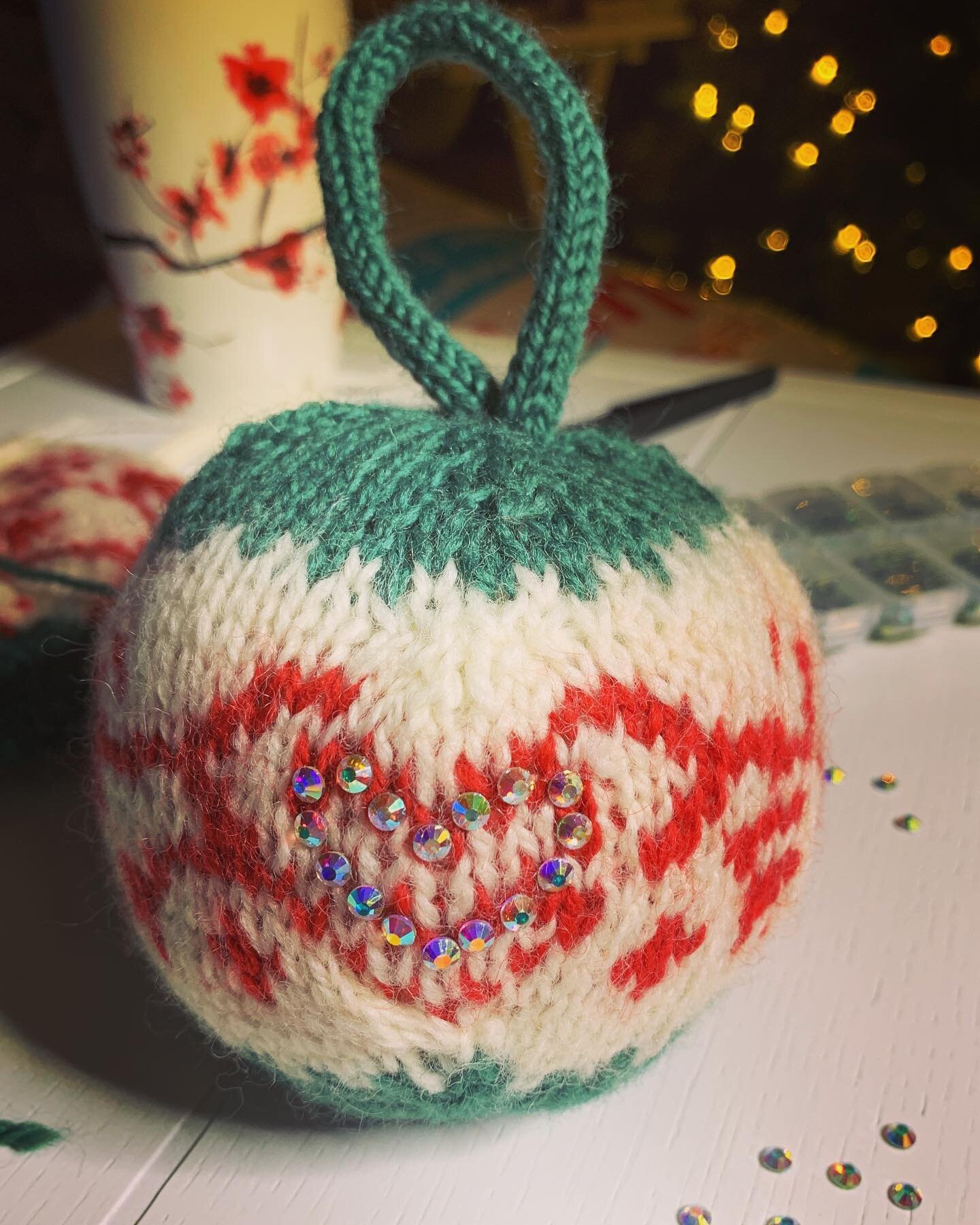 Day 1 of Arne &amp; Carlos&rsquo; Christmas Calendar.
I dusted off the bedazzler and added some bling to this ornament✨
Amazed at my double pointed needles progress as I could not make a knitted ball last year😱

#arneandcarlos #rowannorwegianwool #r