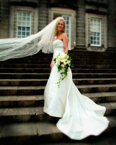Hopetoun House Wedding
Bridal portrait on the steps outside Hopetoun House near Edinburgh, this allows the dress train to flow well. "Looking through the pictures, we are having trouble choosing the best prints as they are all so good!.....
We are so thrilled with the pictures and are so glad that we made the decision to go with you..."
Frances, London