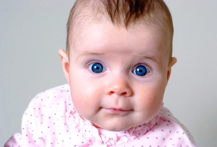 Quick reflexes are needed to capture this expressive family portrait.
