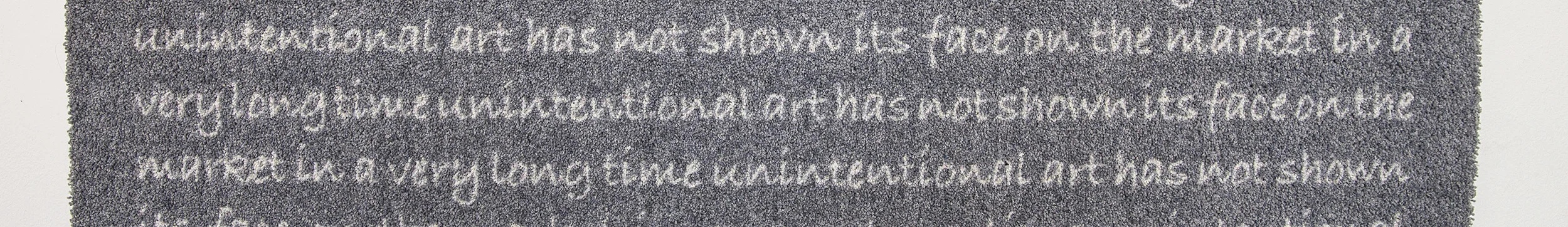  Writing of wall carpet which you could read only in the mirror at Sotheby's Vienna exhibition space. 