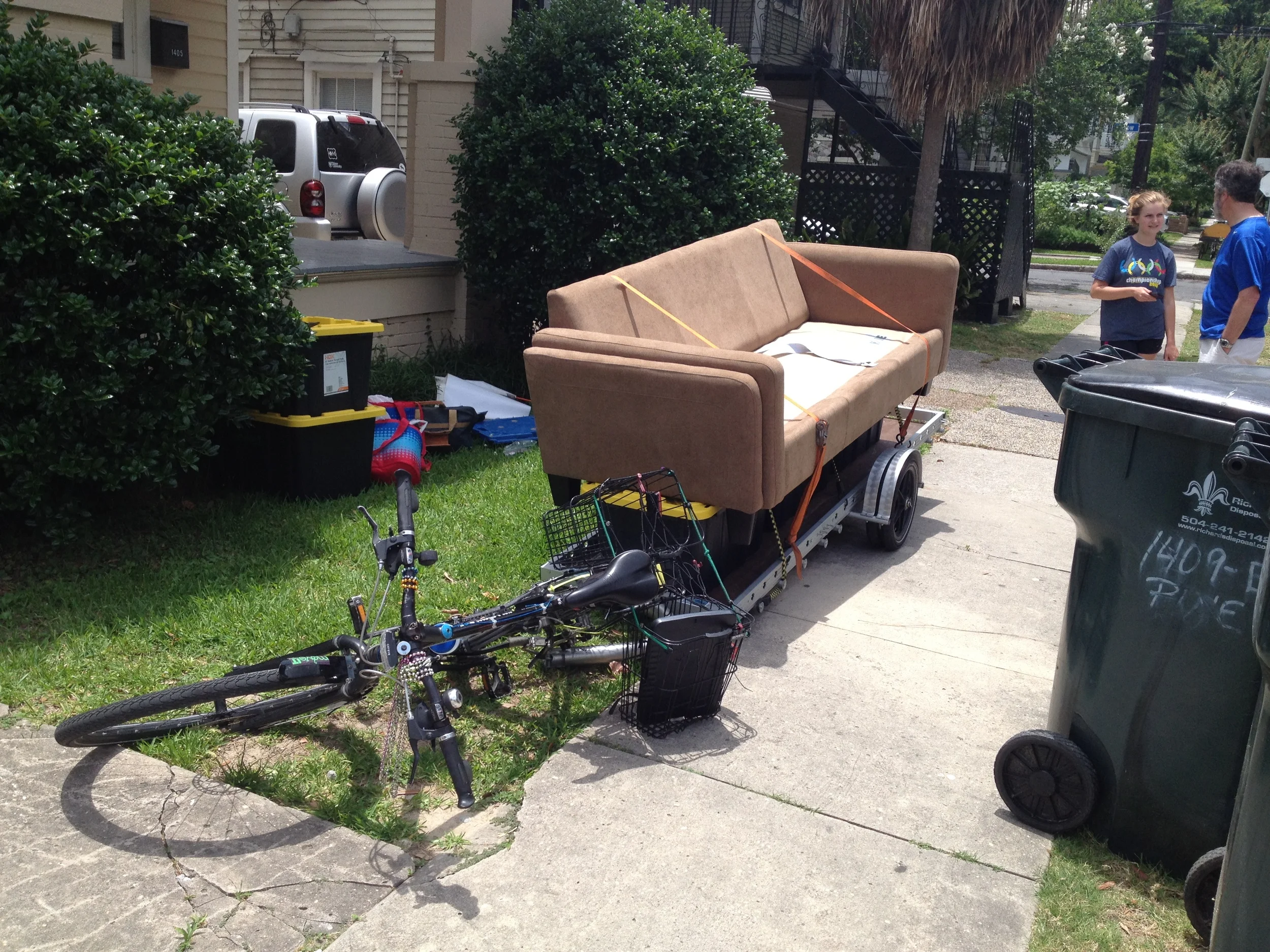 After being lowered down with ropes the couch is loaded and ready to go.