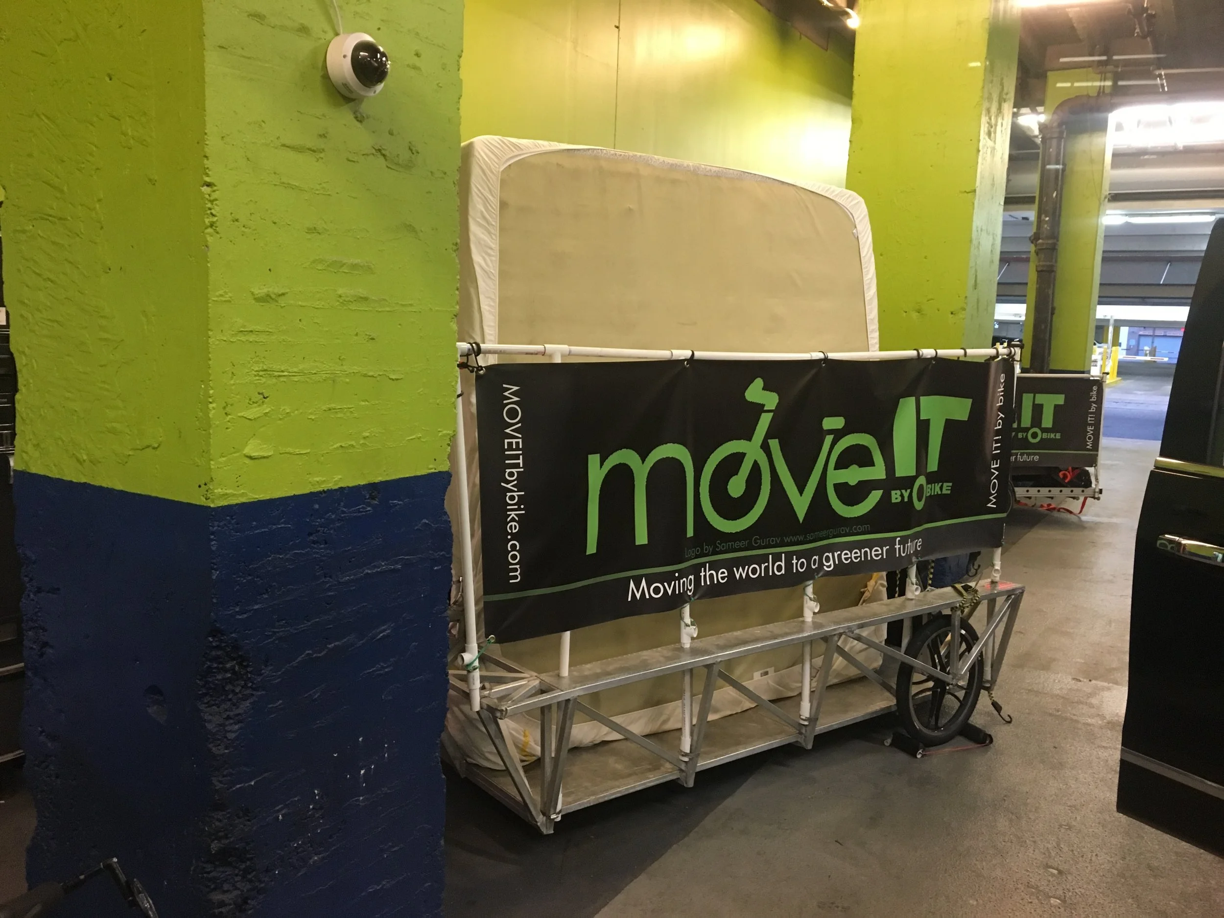 King mattress on trailer. The headboard and frame were already unloaded and being assembled in the apartment.