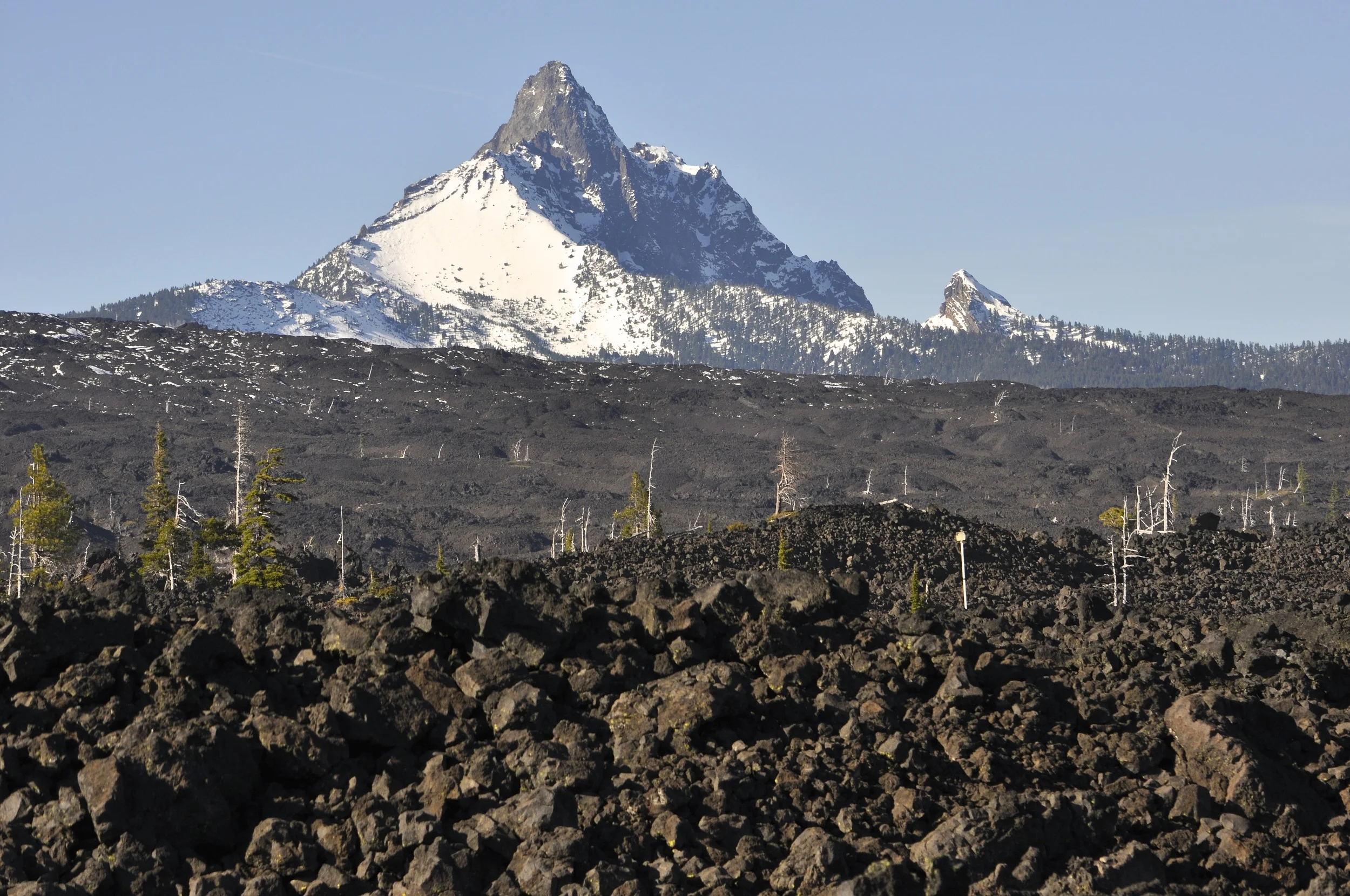 Mt. Washington, one of the oldest volcanos in the Cascades, was active between 300,000 and 500,000 years ago. The lava here is from three flows, including Belnap and Little Belnap, which are to the left of of this photo.