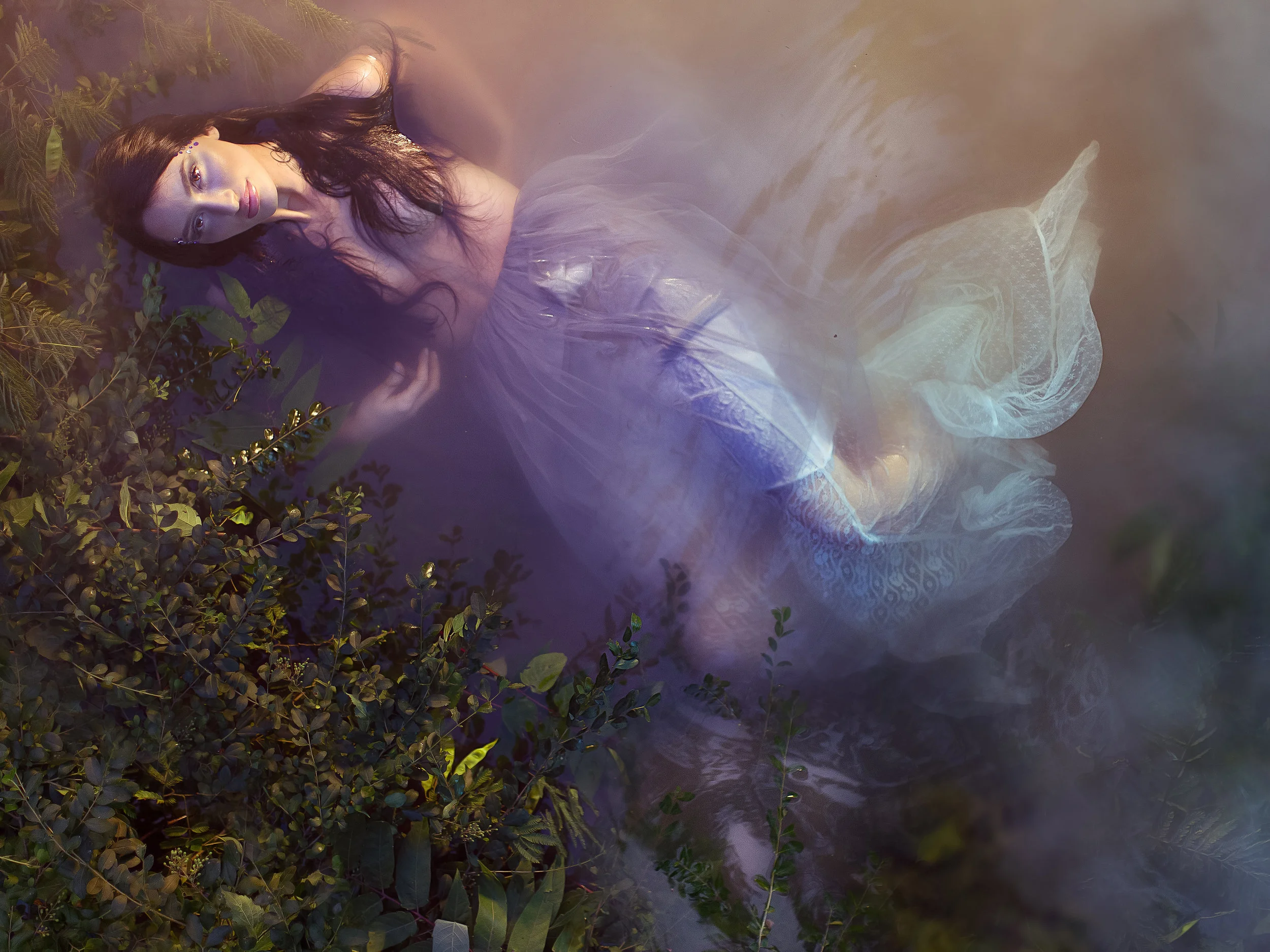 Deep Water. She keeps us balanced and cleans our bodies. She falls like rain and fills up oceans deep. The beauty of color that comes from the darkest of blues, to ivy greens and browns of earth to whitist snow. Her power is rooted in motion. Immortal motion. She flows and moves and wraps around the Earth to bring life to all creatures. 