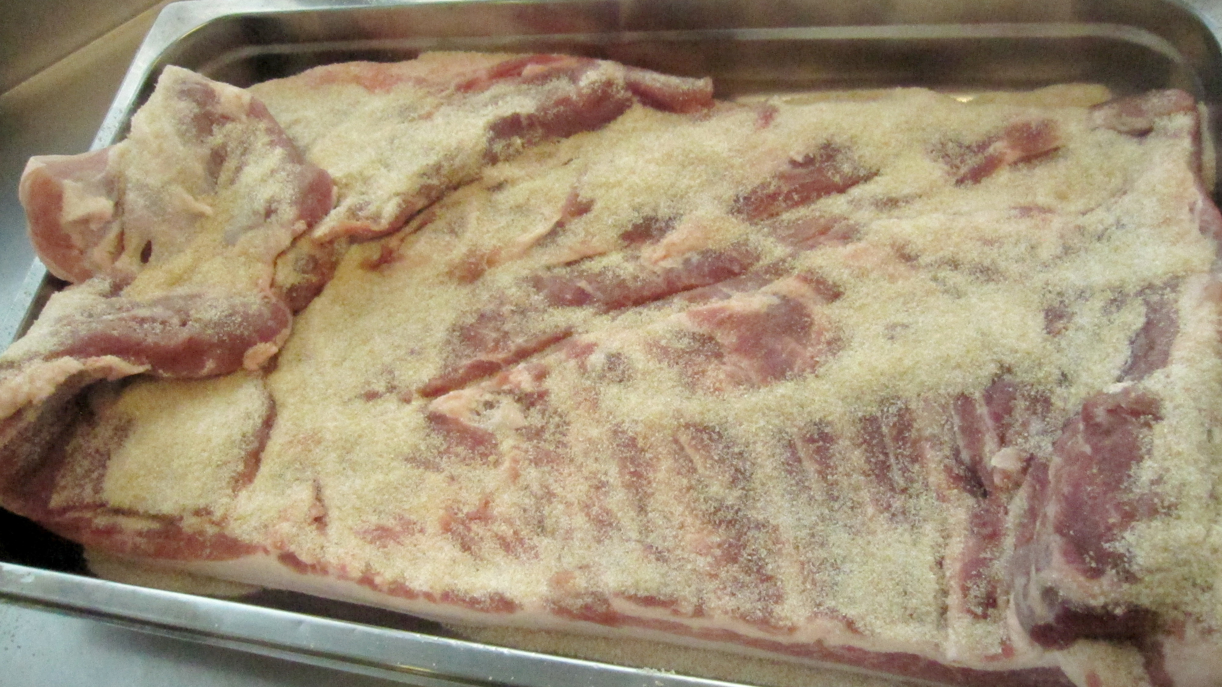 Thoroughly coat the belly flesh with the cure
