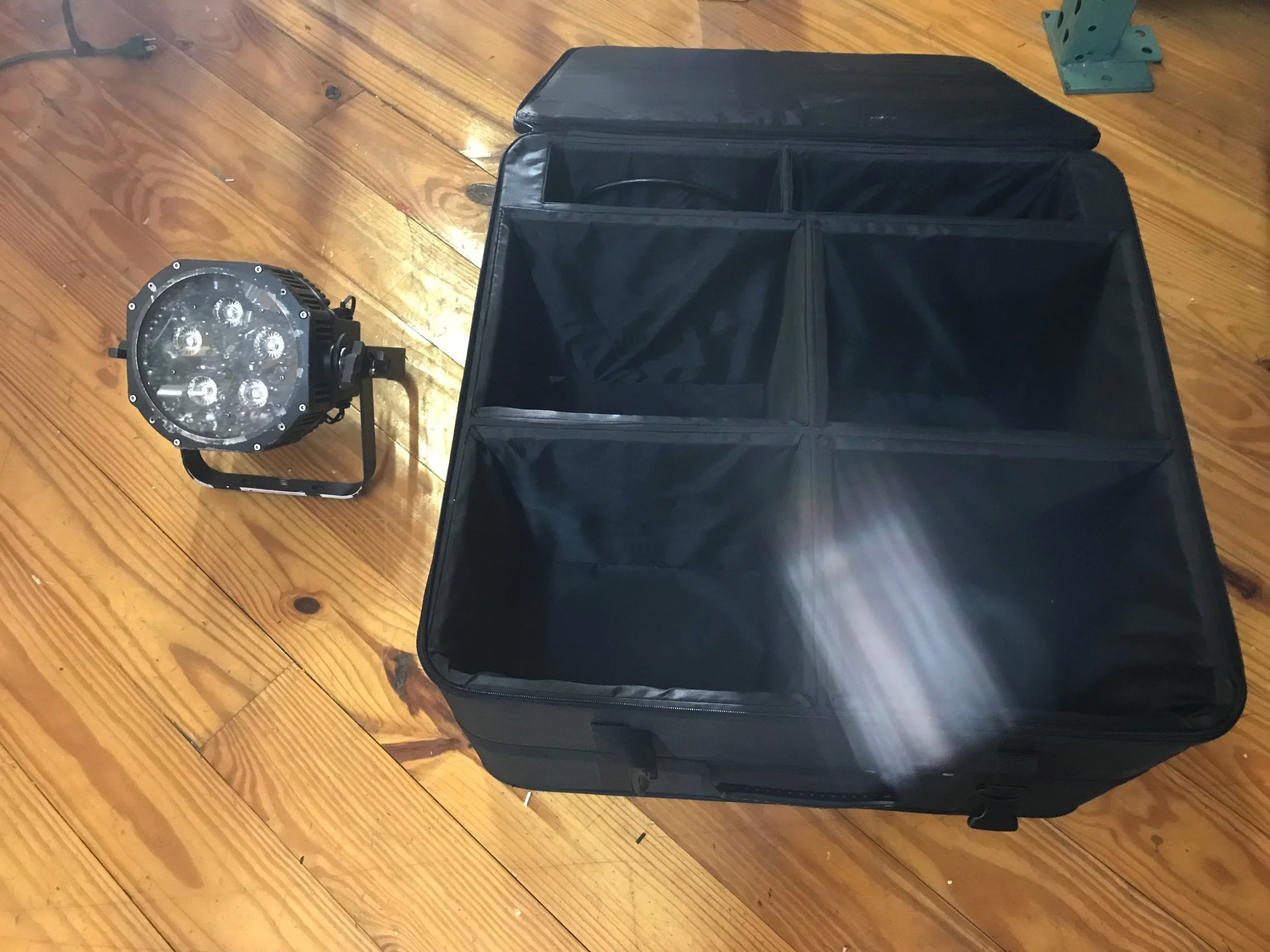 Here we have a rental light and the case. You will get 4 of these lights ready to throw in the back of an SUV, and GO Red!