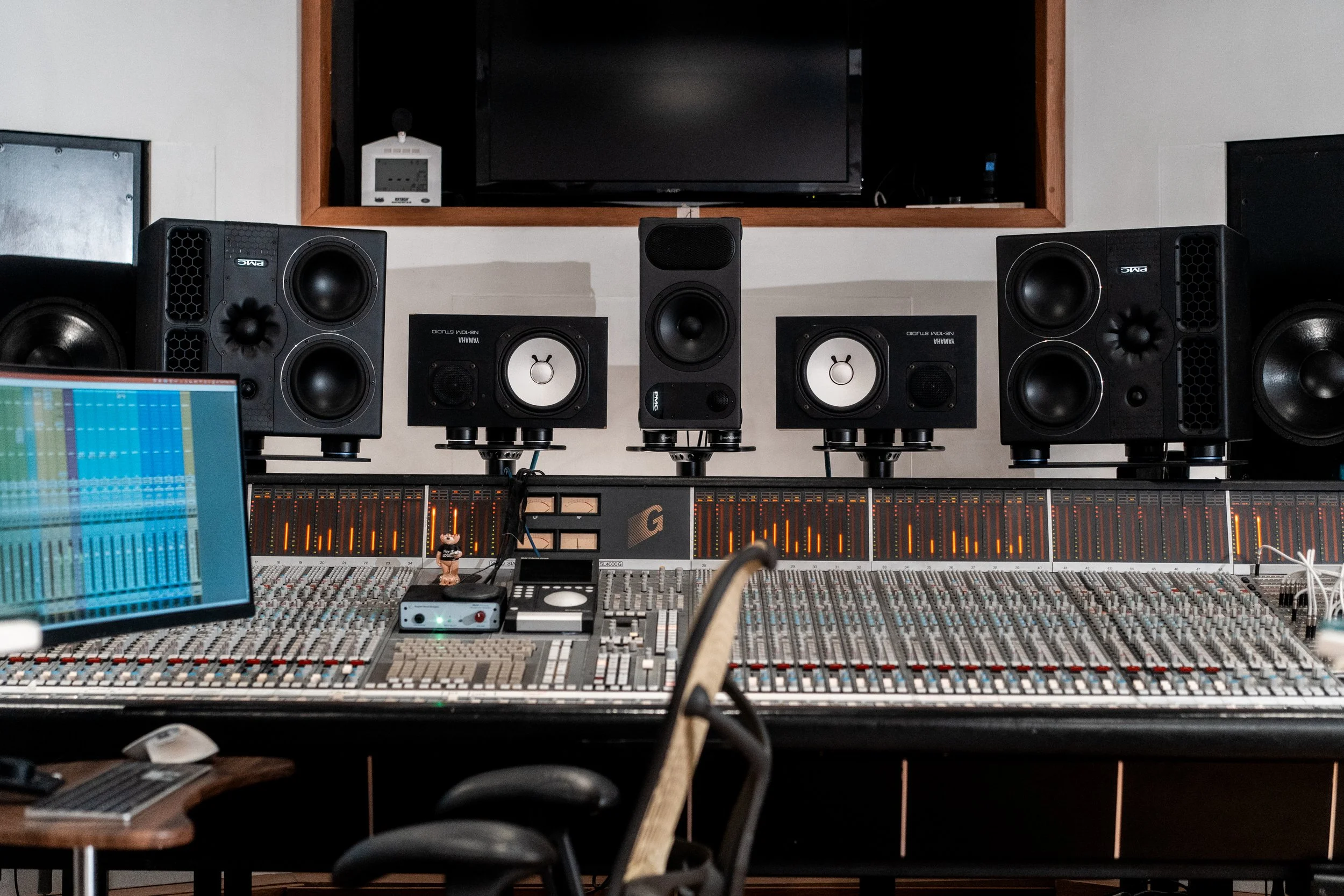 Westpoint Studios, a professional recording studio with large speakers, an SSL mixing console, a computer screen, and audio equipment.