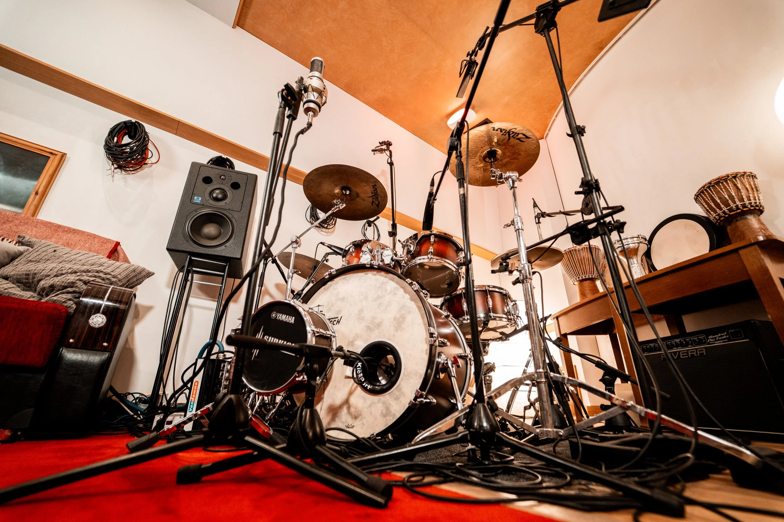 Our six-piece Gretsch USA Custom 130th Anniversary kit pairs sumptuous tone with a distinctive selection of vintage and modern cymbals, surrounded by warm timber and rich red carpet in Studio 1’s live room.

Take the drum stool. Give your next record