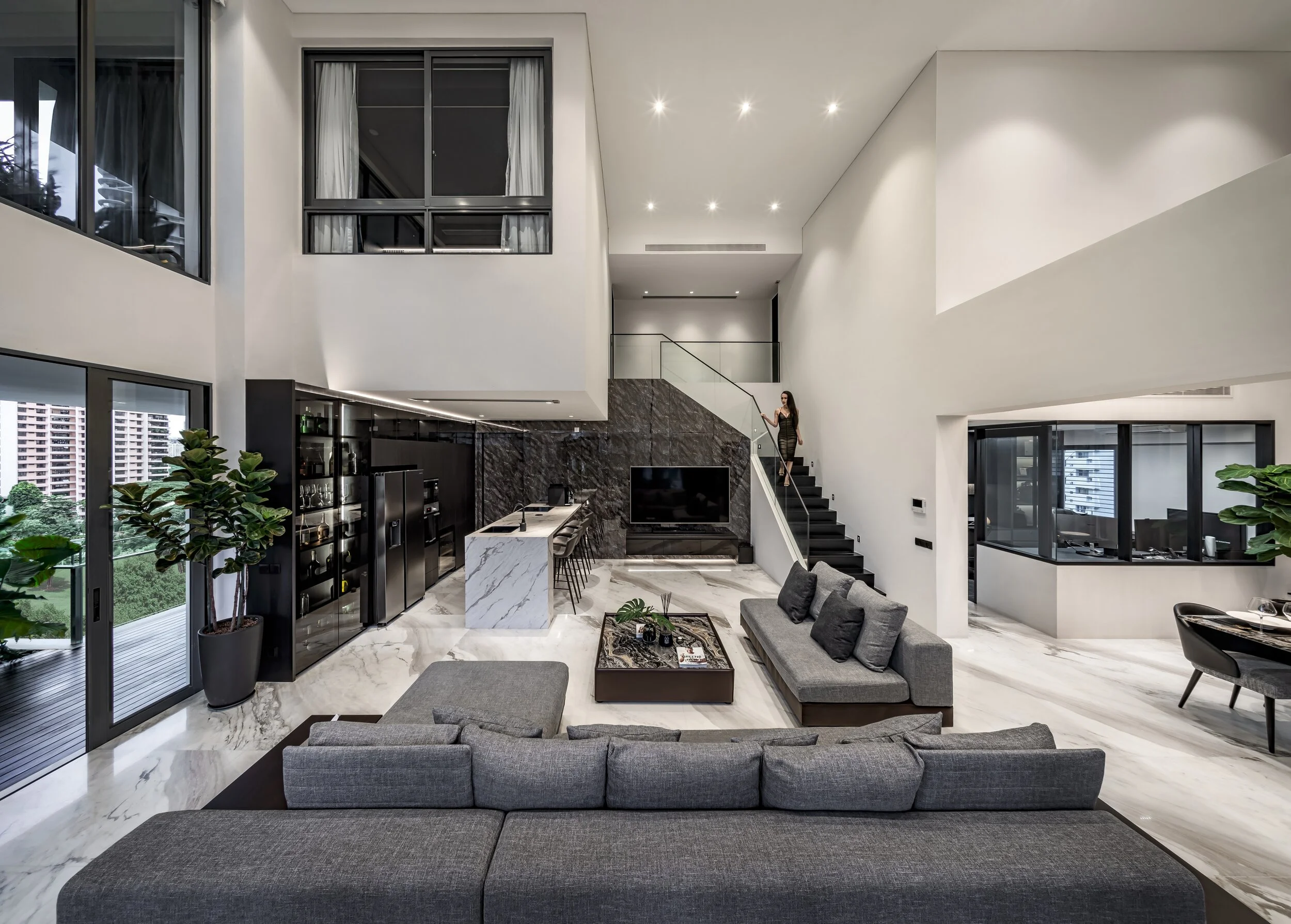 A modern luxury grey-white living room with indoor plants.