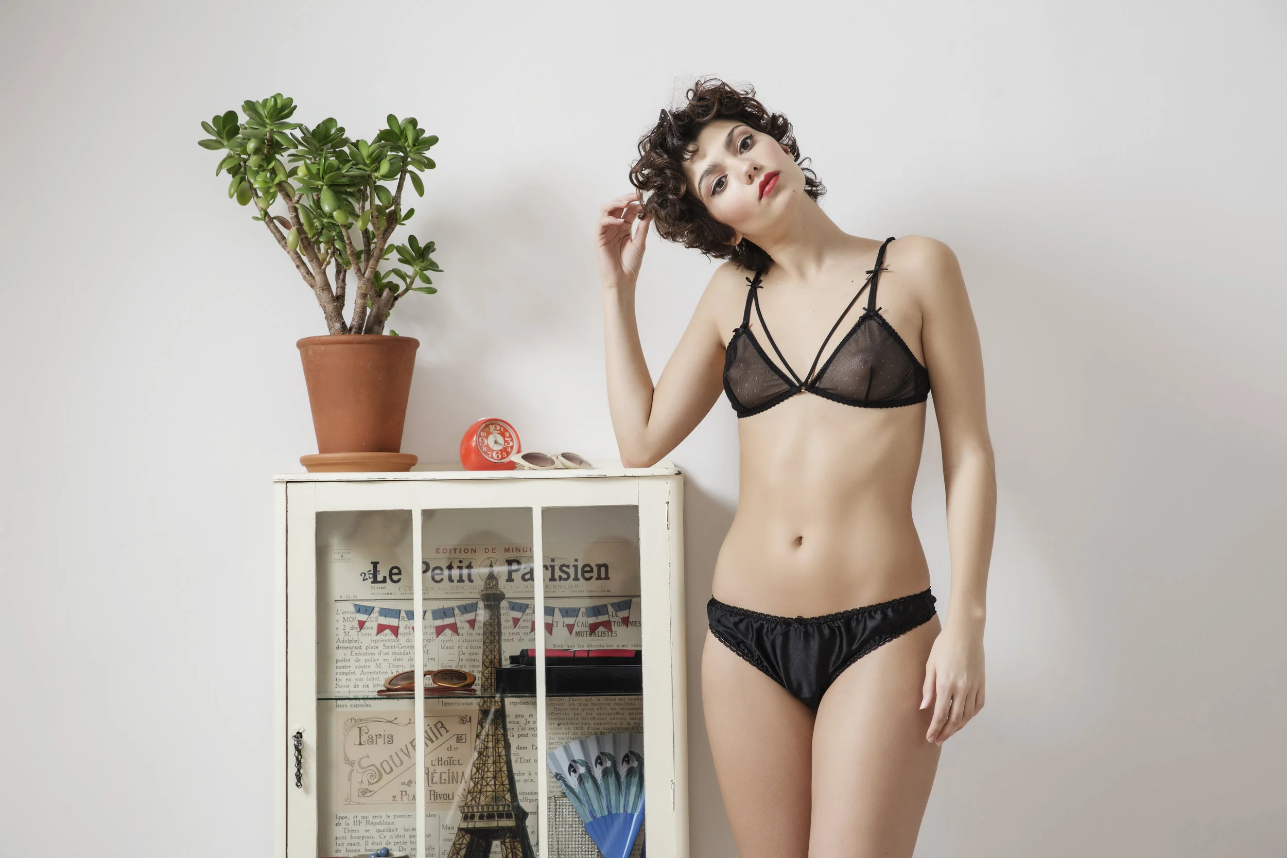 Black silk thong with bow on the back