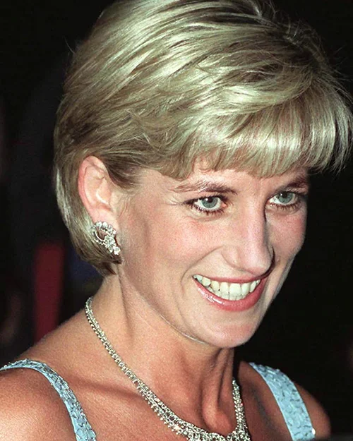 Princess Diana wearing diamond earrings without the pearl.
