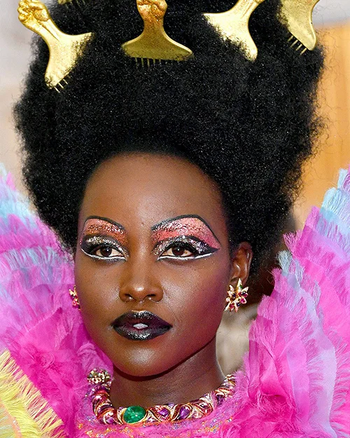 LUPITA NYONG’O | wearing heritage Bulgari jewels, featuring emeralds and amethysts