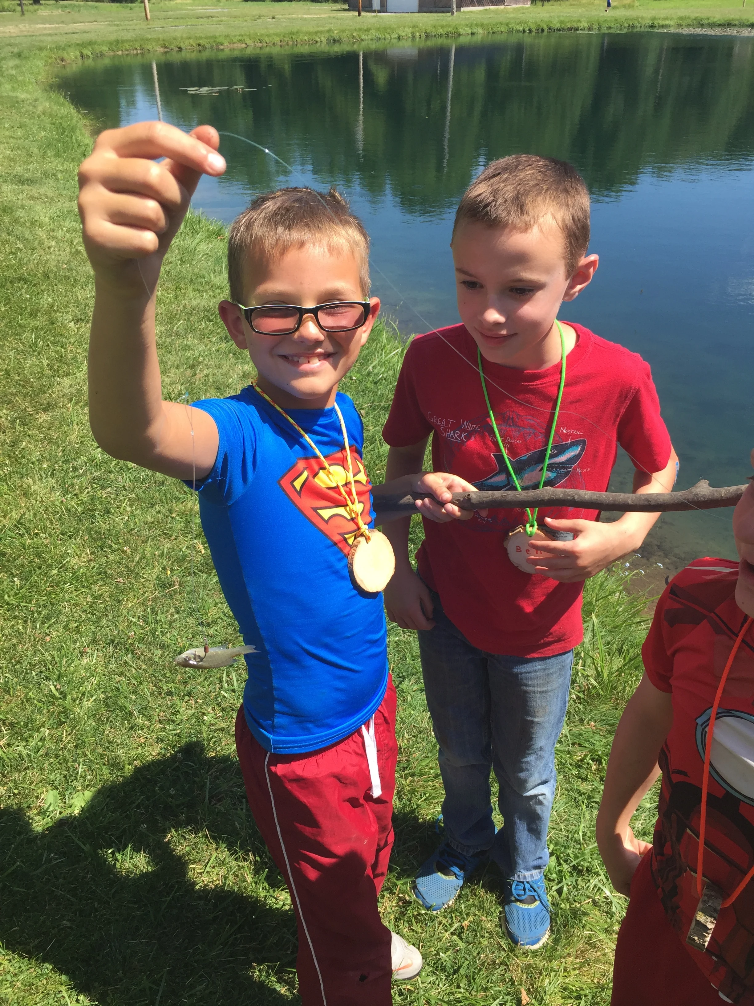 Caught this little guy with a home-made fishing pole!!