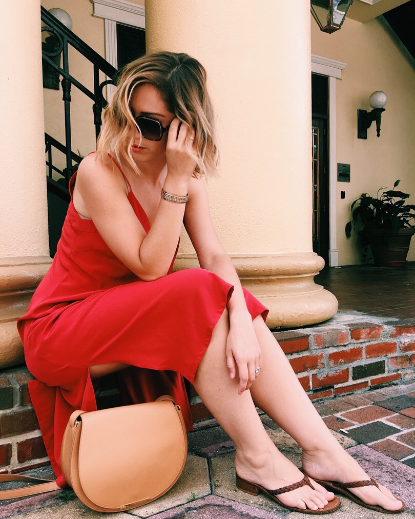 Wearing Cuyana slip dress and saddle bag