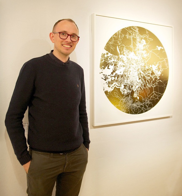 Me standing with my Mappa Mundi Jerusalem on display at Christies.jpg