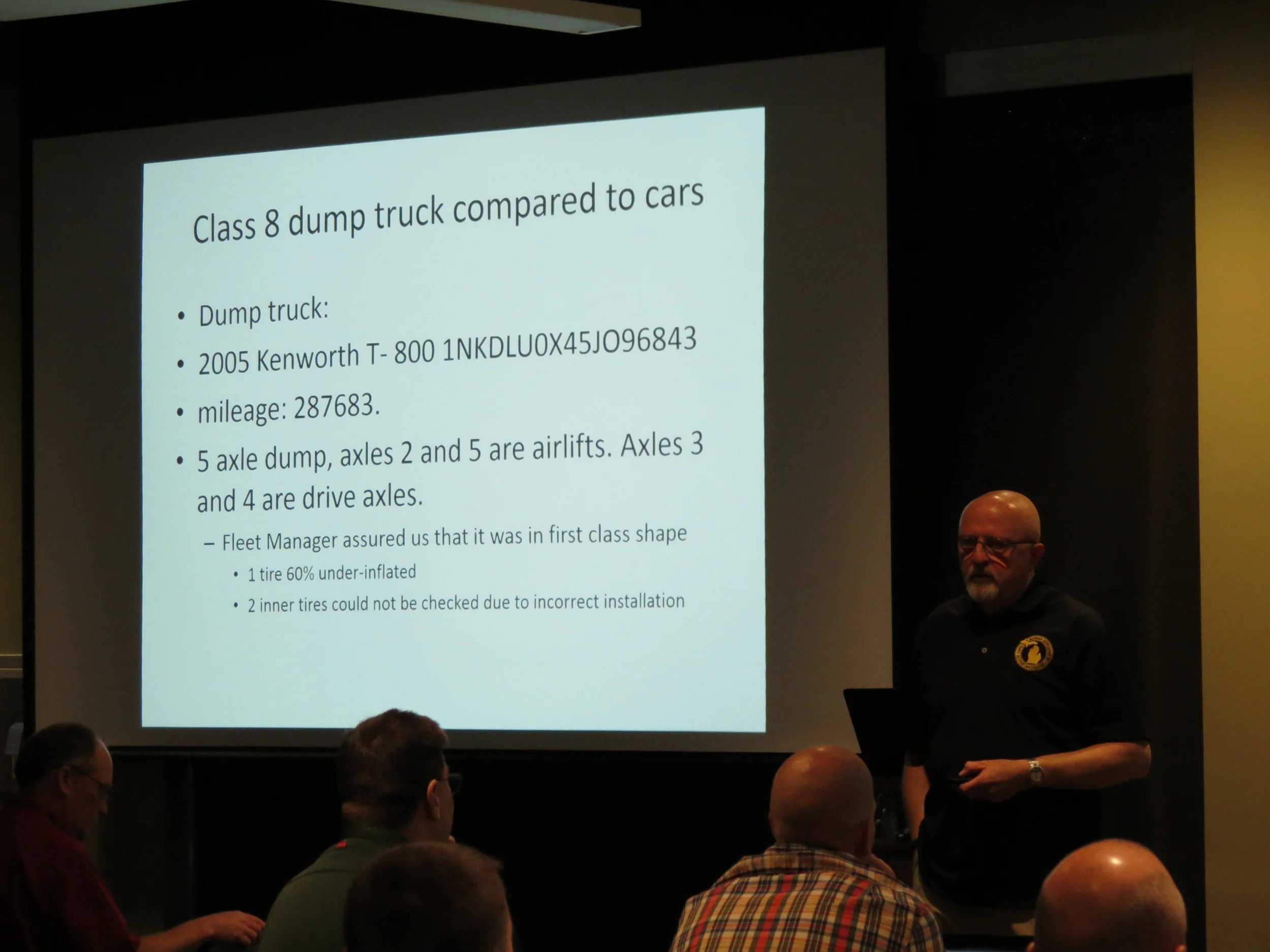 Bruce Beill presenting on vehicle tires and their associated braking ability.