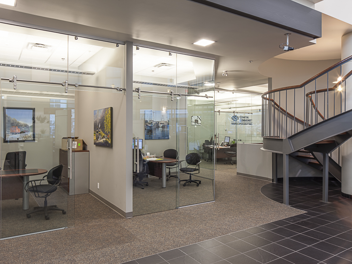 Consolidation and relocation of banking services within existing lobby.
