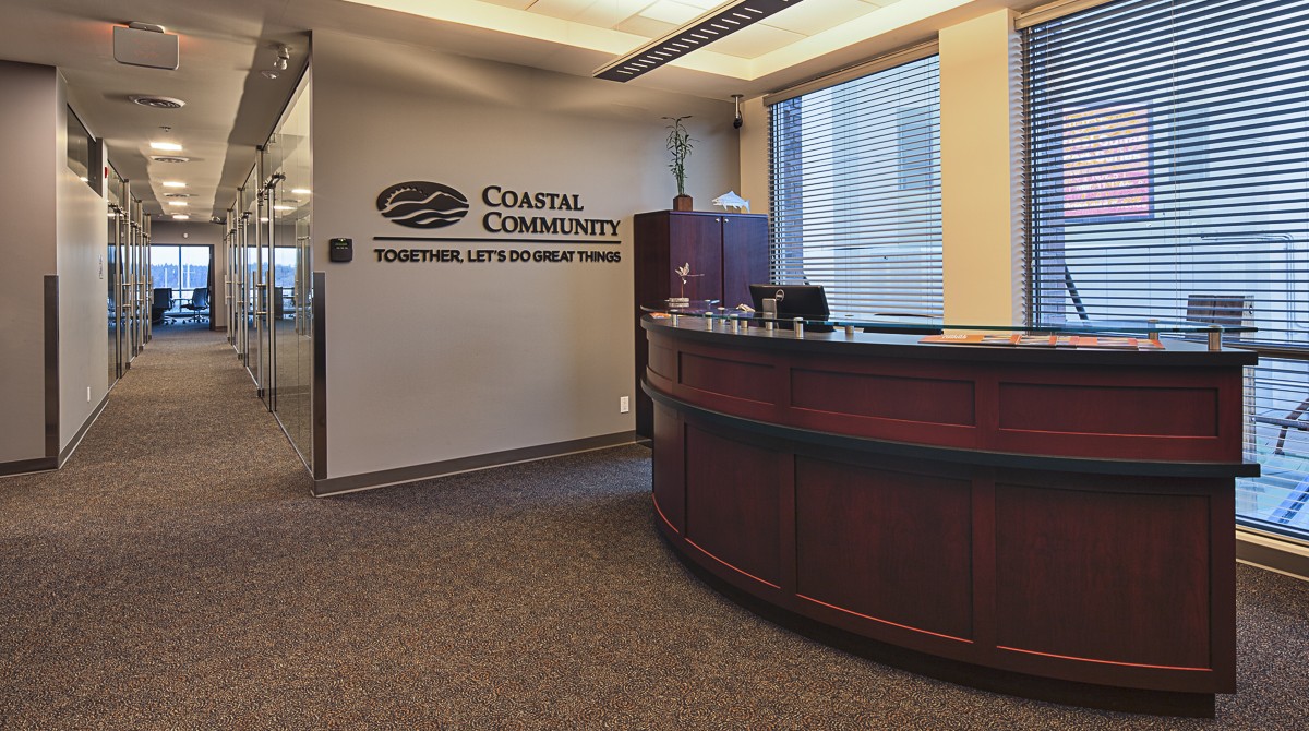 Conversion of double height lobby to upper floor administration reception area.