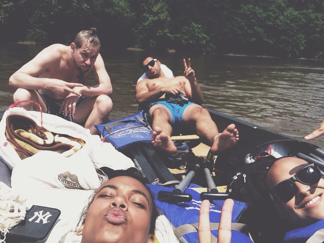 Tying our canoes together with our life jackets = ultimate relaxation.
