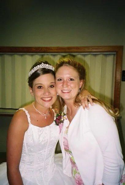My wedding day and my dear friend from college who was lovely enough to play violin for us.