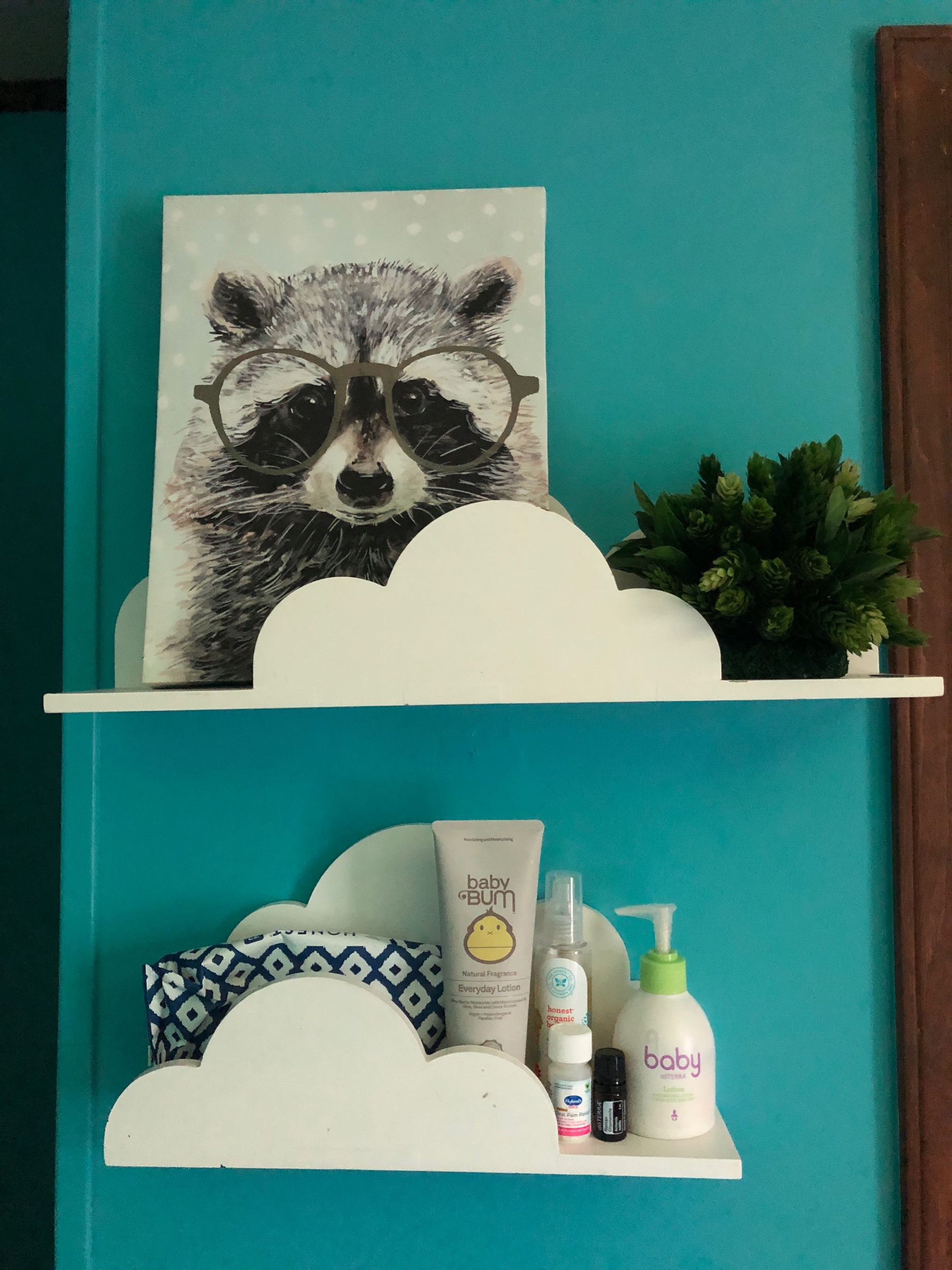 Now, my placement of these shelves may make some of you squirm a bit. However, I hate symmetry. I love odd numbers. And, if something looks like it should fit logically one way (like the small cloud on top of the larger one, in this case) then I do the opposite. I love being unique. It suits me.