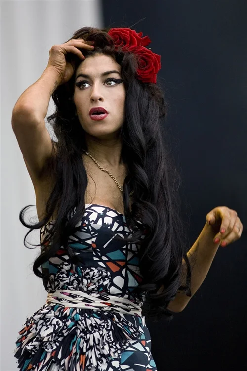 At V2009 in Chelmsford she looked incredible. I was always stunned by her talent (I first shot her at Virgin Megastores years ago) and all that other stuff didn't matter I didn't think, until it did of course. My most hated thing is waste and her early demise is such a colossal, tragic waste.
