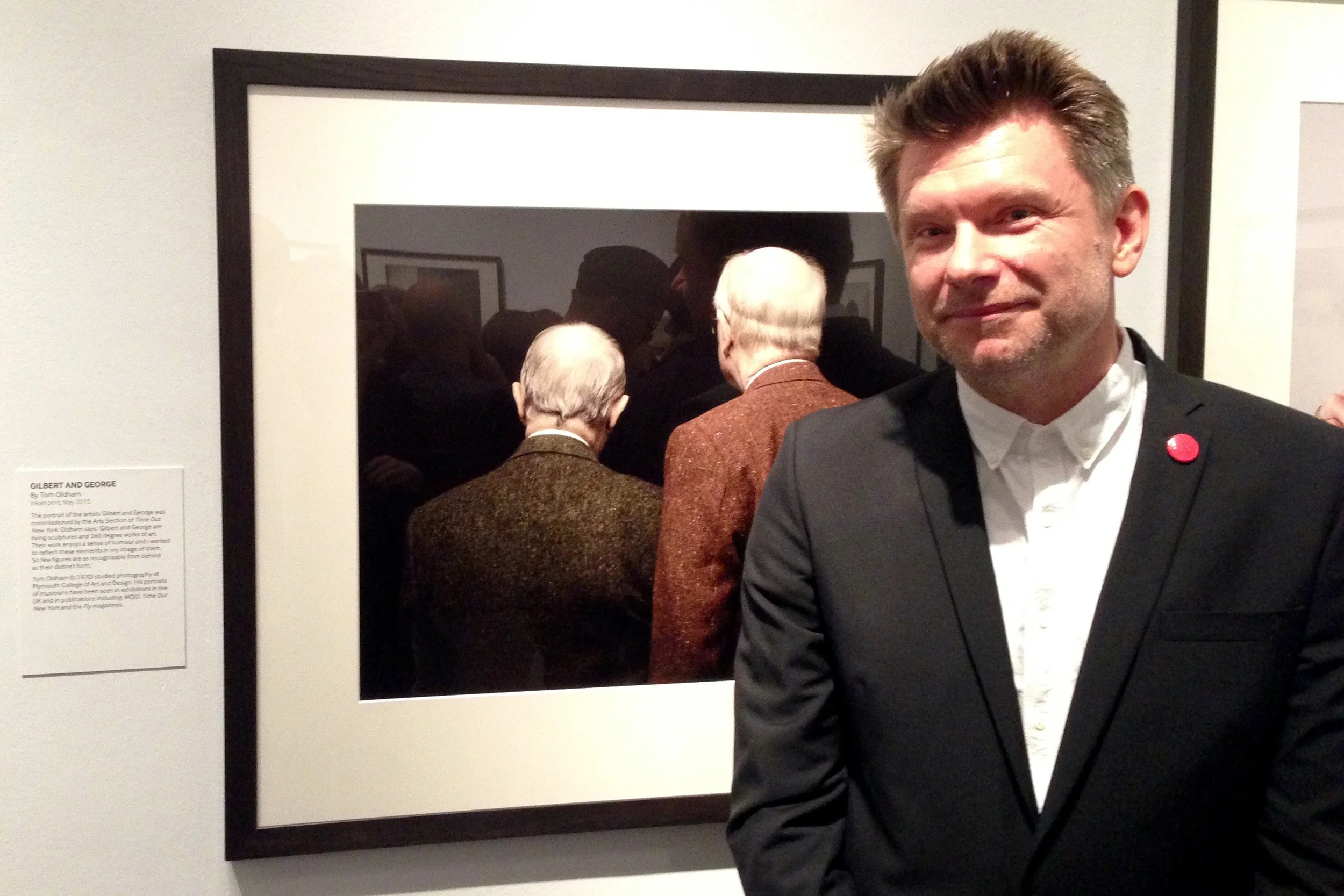 After so many years of trying, my work is at last hanging in the National Portrait Gallery as part of the Taylor Wessing Portrait Prize. I could weep. This is a picture of me (thanks Brian Whar) at the Private View last week, feeling pretty happy. And relieved actually - I was beginning to seriously question how I could call myself a portrait photographer yet not get amongst the annual best 60 portraits once again - then you get the email and everything is ok. The experience has been absolutely top notch as well, the print has a great position in the show, it was used on the private and press viewing invite, is a postcard for sale in the shop and the gallery is using it in their mail outs, as well as this gem in the Telegraph Arts section which was the icing on the cake (read to the last paragraph if you have nothing at all to do just now). Huge thanks to Brian Whar, Richard Chan printers , Gilbert and George, and Hope and Sally Anne for coming down. You're ace and I love you.