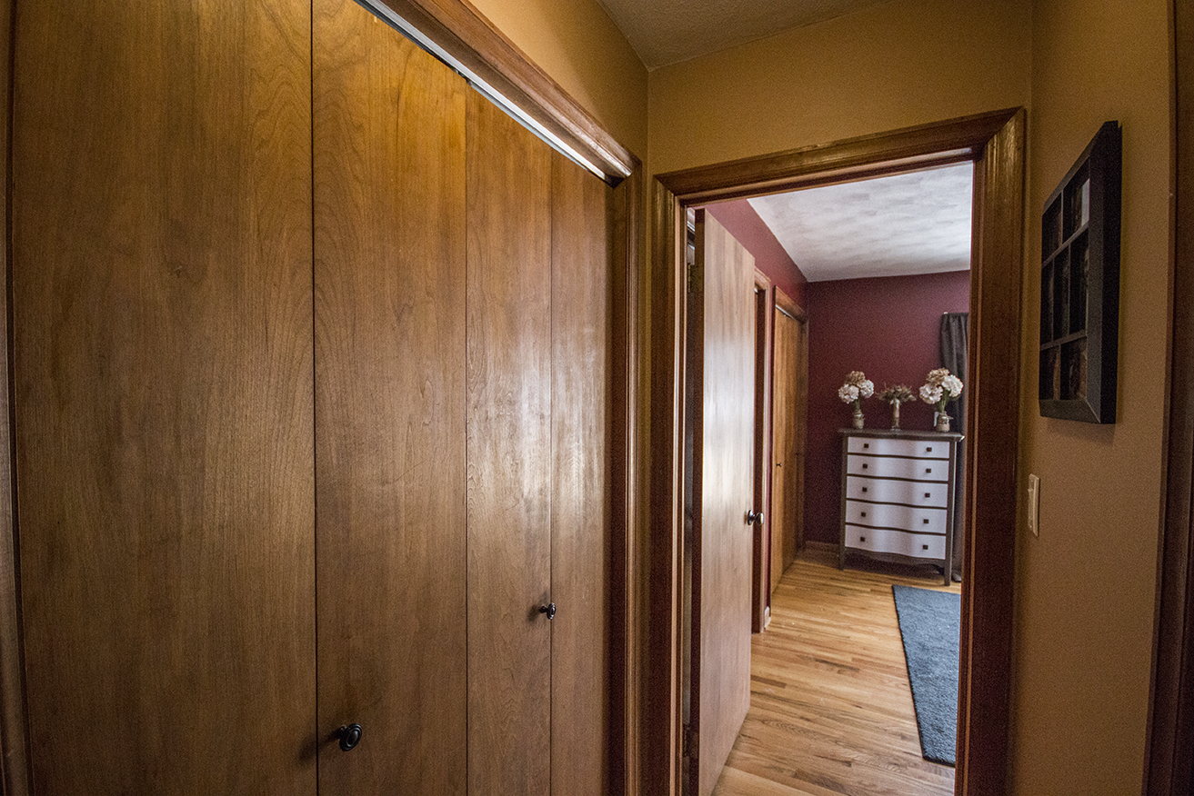 Changed: Brown paint, door knob, wall art.