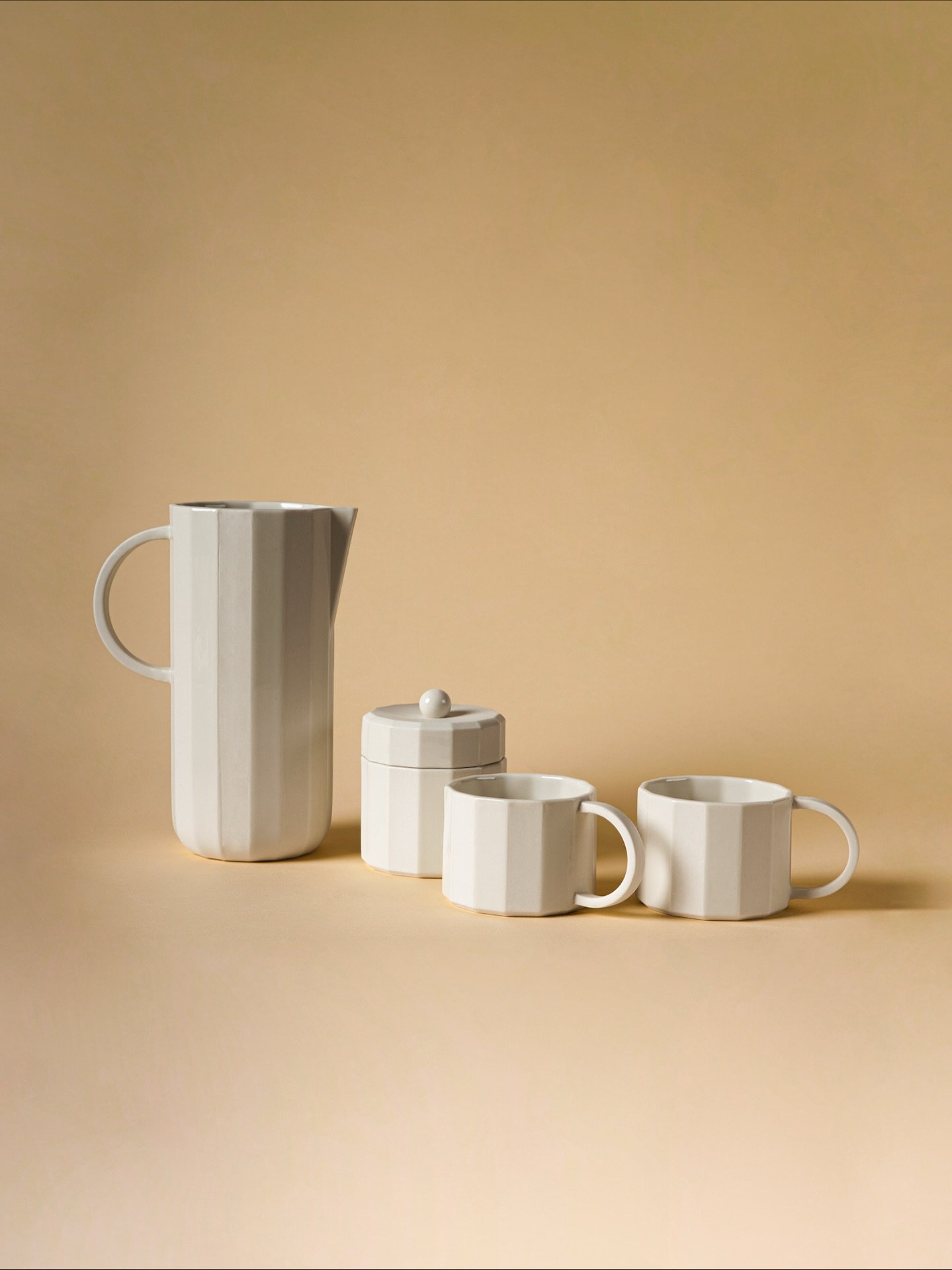 The Facet porcelain collection explores the meeting point of geometry and tactility. Cast and finished by hand in our own ceramic studio, every piece carries subtle traces of the making process, a quiet reminder of the human touch behind its precisio