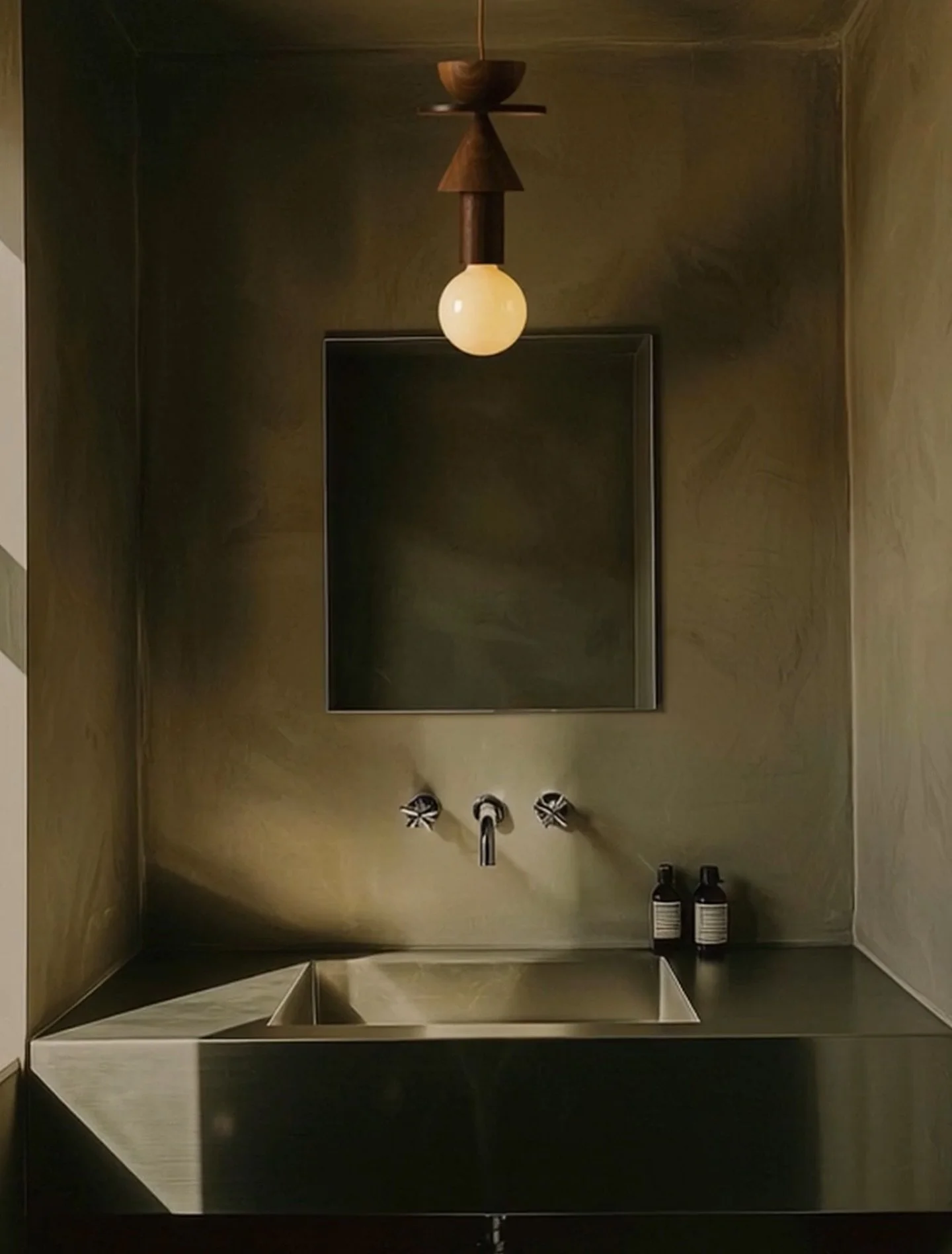 Within the depths of muted tones, the Junit Stanza lamp draws a gentle counterpoint &mdash; its sculptural form and warm walnut presence balancing shadow, reflection, and form. Crafted with precision and material sensitivity, the piece introduces a q