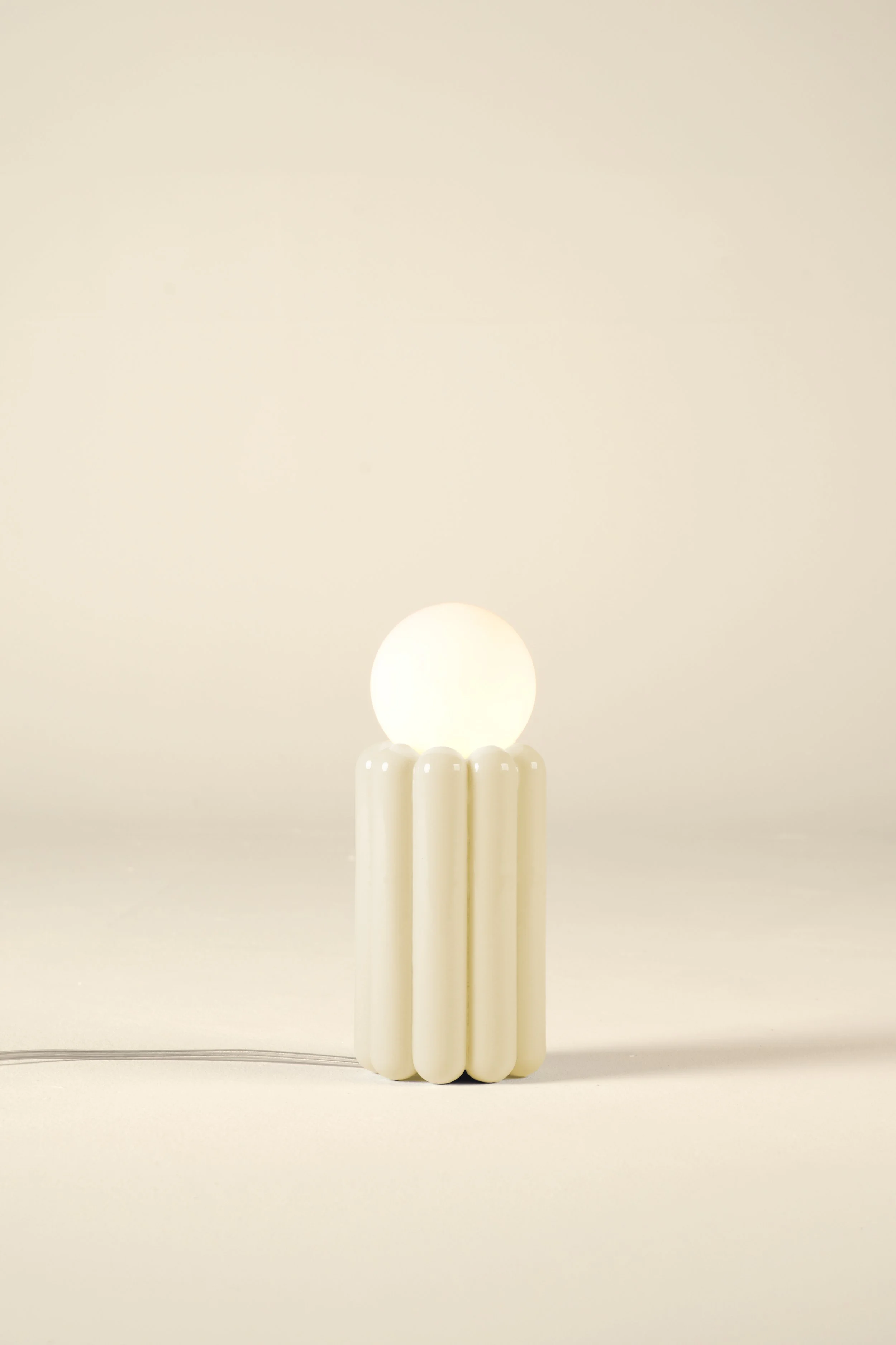 STUCCO_TABLE_LAMP_BUTTER_CUT_OUT_SHOP.jpg