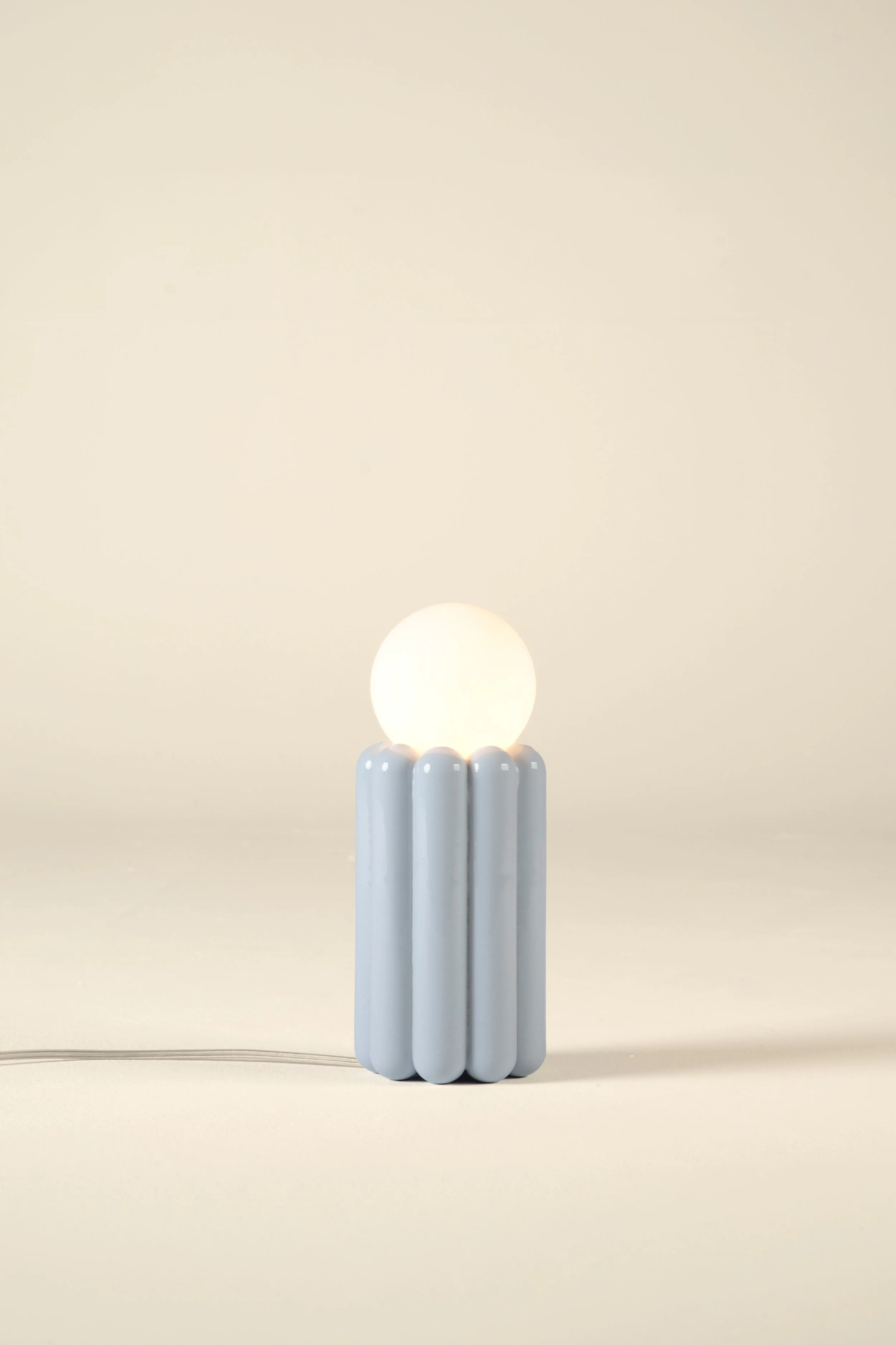 STUCCO_TABLE_LAMP_LIGHT_BLUE_CUT_OUT_SHOP.jpg