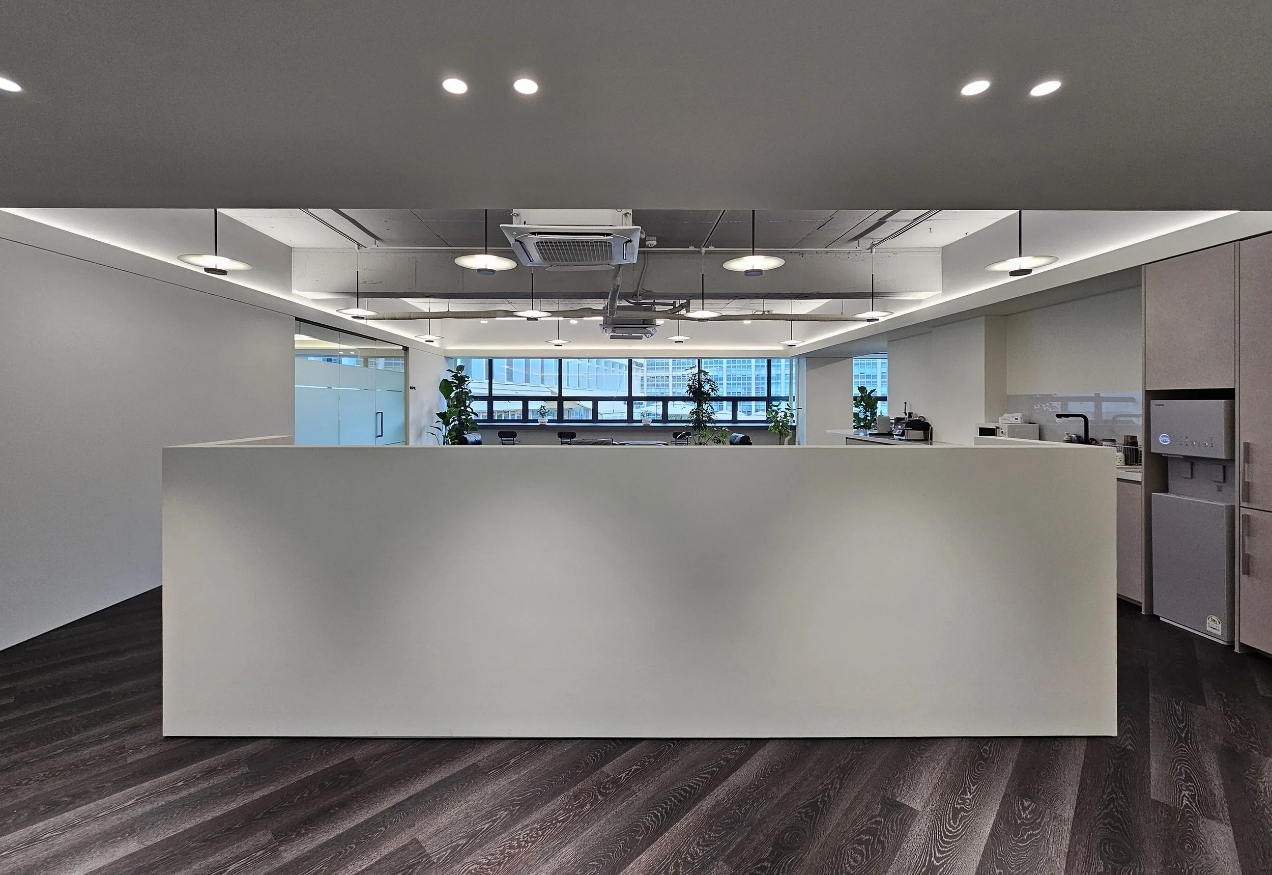 VIew of the bench seating wall from the entrance