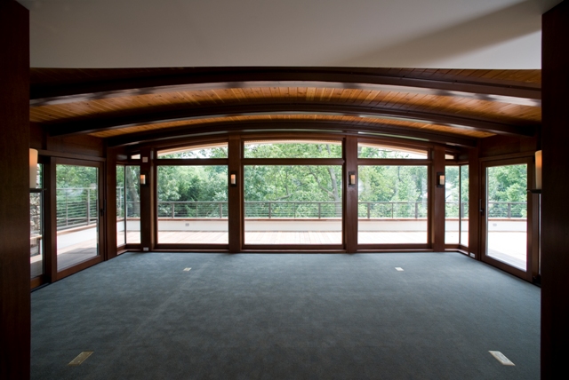 Custom Arched Windows and Sliding Doors