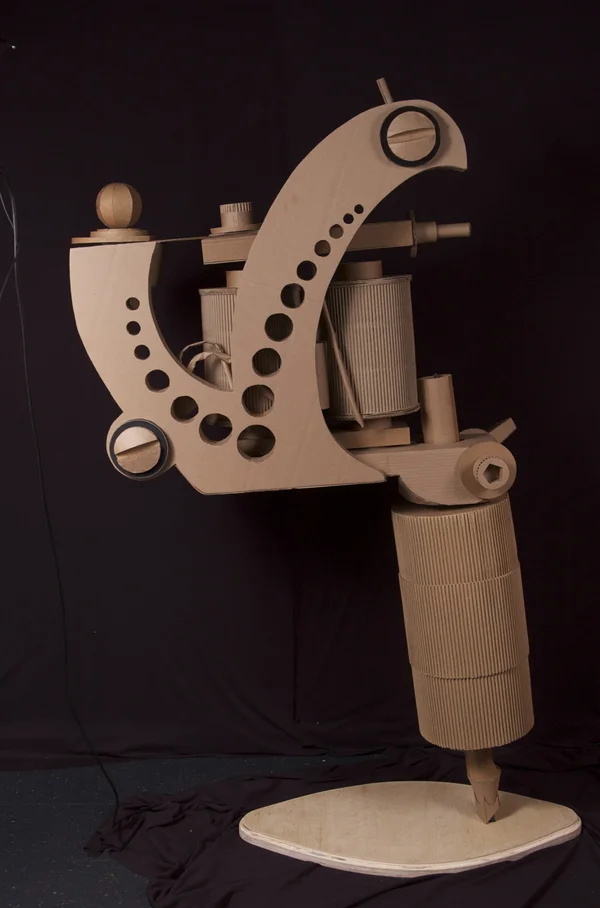 Cardboard tattoo machine.
