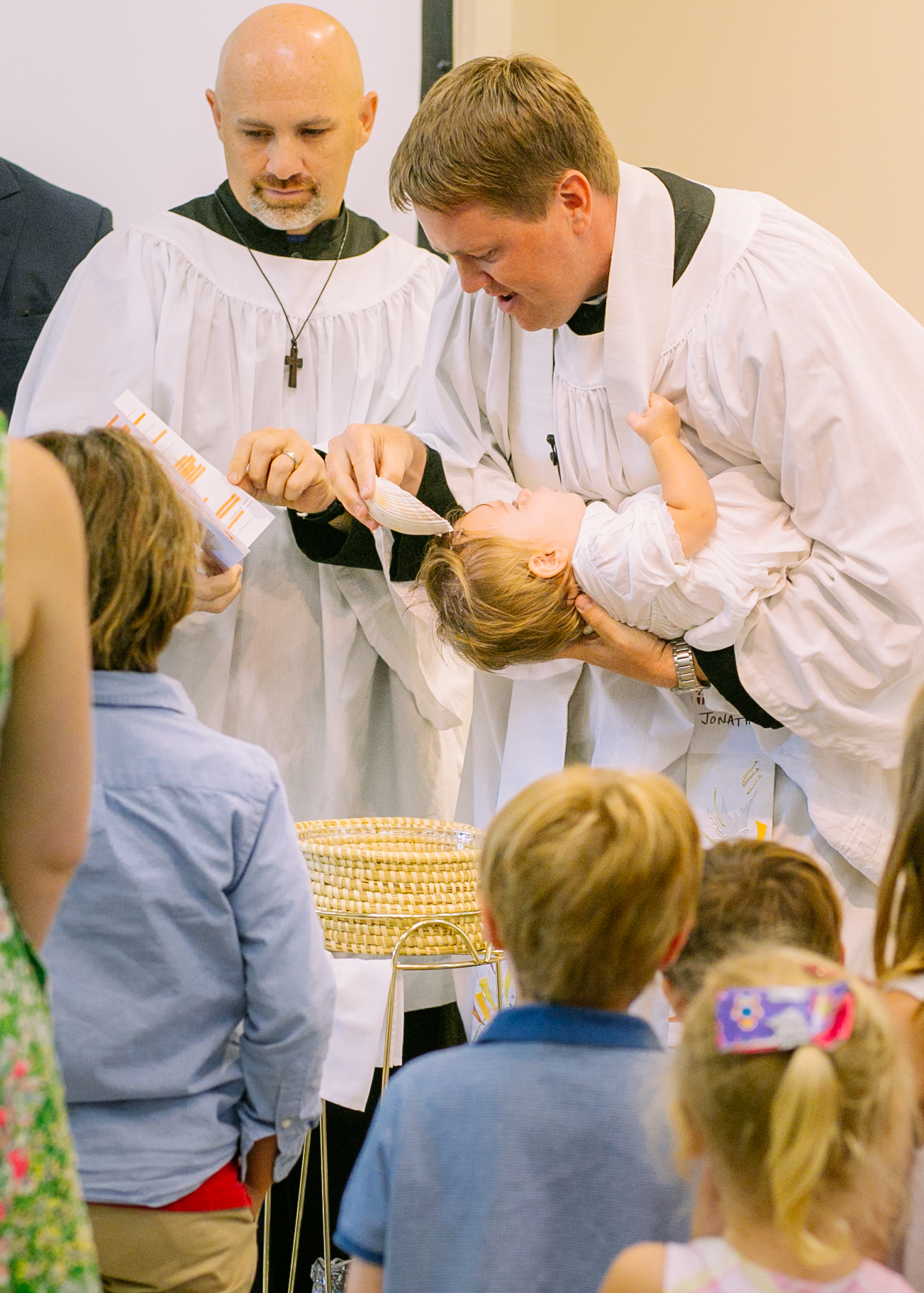 A baptism at Holy Cross, Daniel Island, celebrated by the Rev. Jonathan Bennett. Photo by Anna Warner, 2015