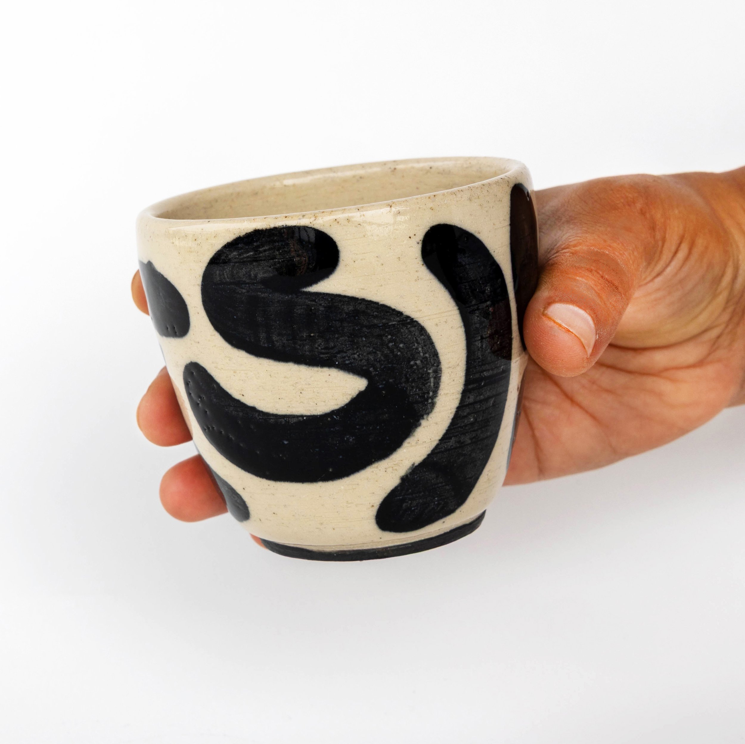 Calligraphy_cup_square_handholding.jpg