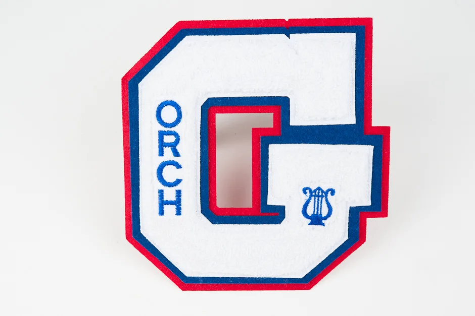 Letter with two-color felt contrast, emblem and text