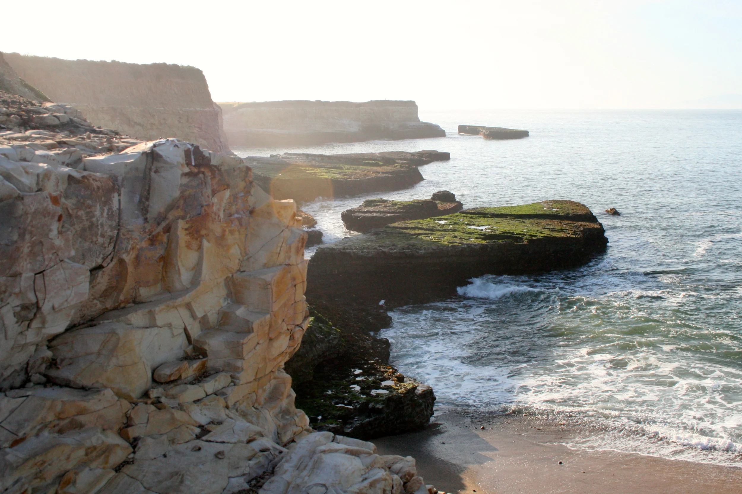 A little backlighting with your craggy cliffs. (I am a fan of lens flares.)