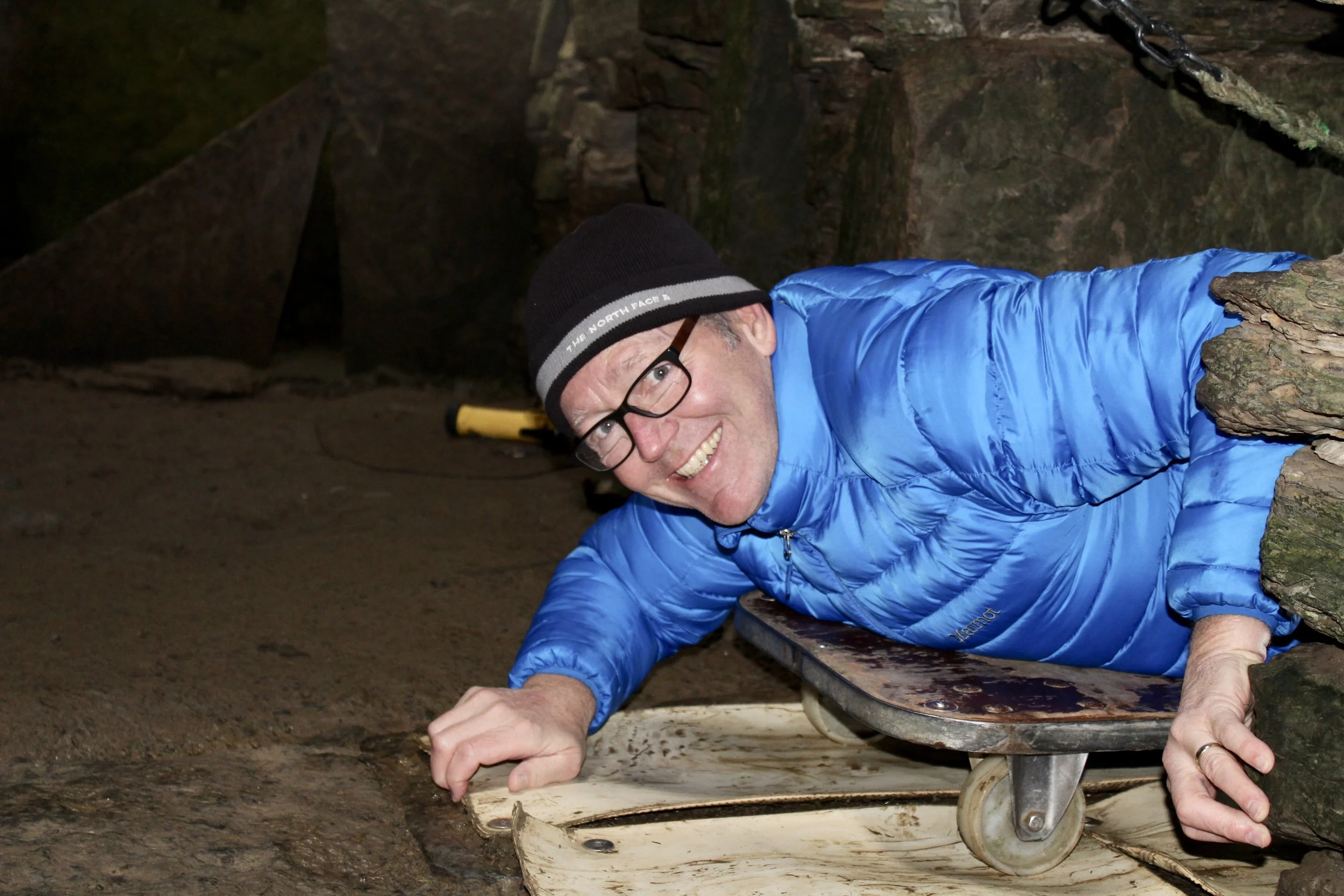 Scooting inside the Tomb of the Eagles. 