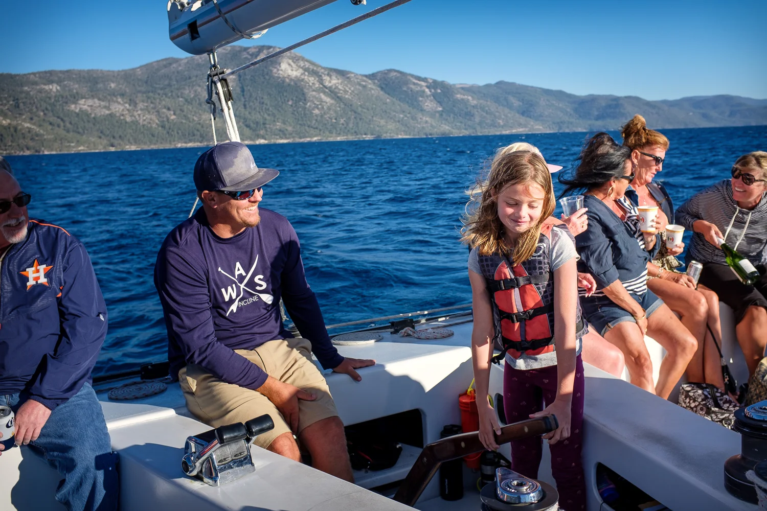 On our last day, we went out on a catamaran that ended up being a bit of a booze cruise. But, since our kids were the only ones on the boat under the legal drinking age, Captain Rusty let Quinn steer the ship.