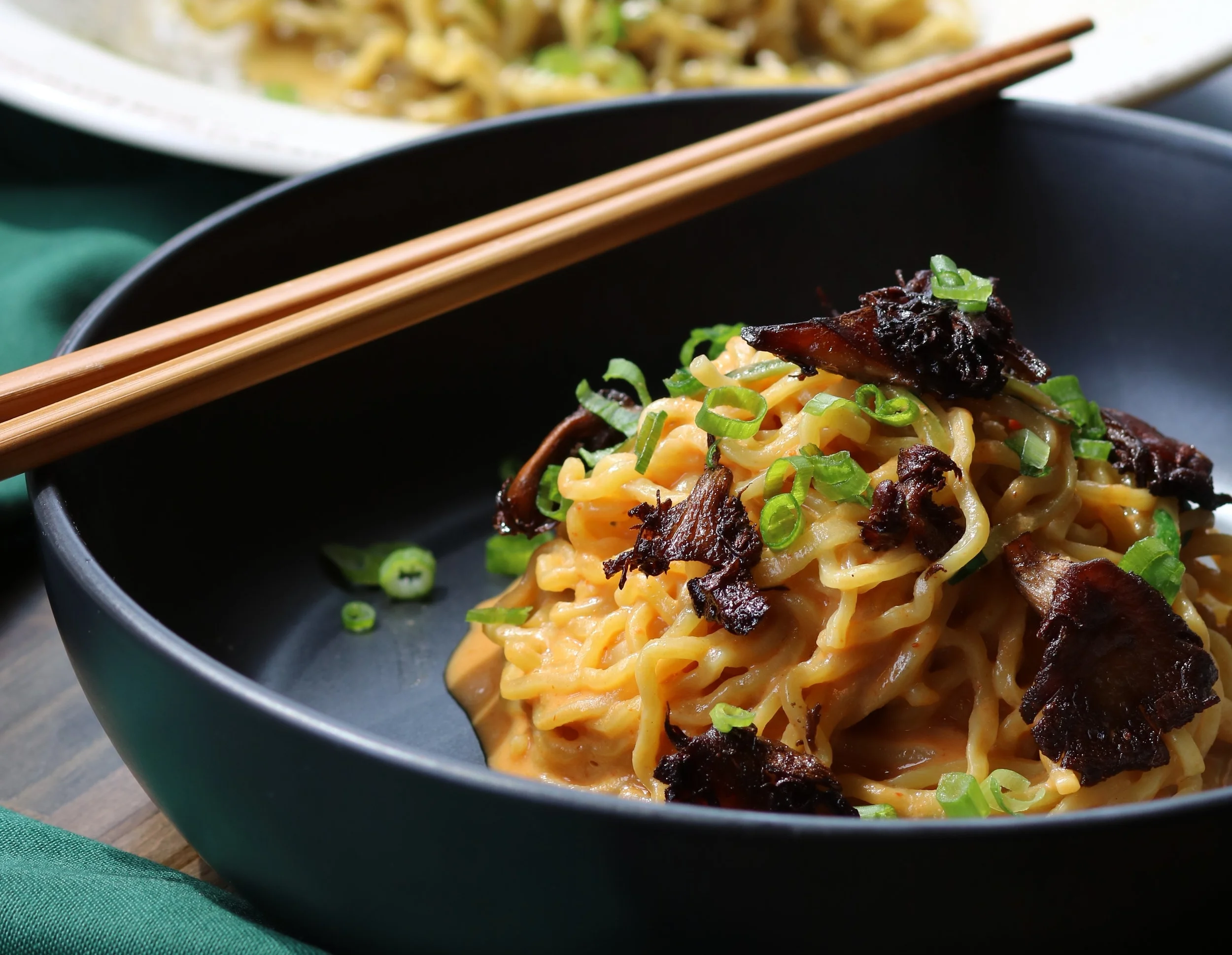 Spicy Dan Dan Noodles with Sichuan pepper, red chile, 5 spice mushrooms. Photo by Fancy Radish