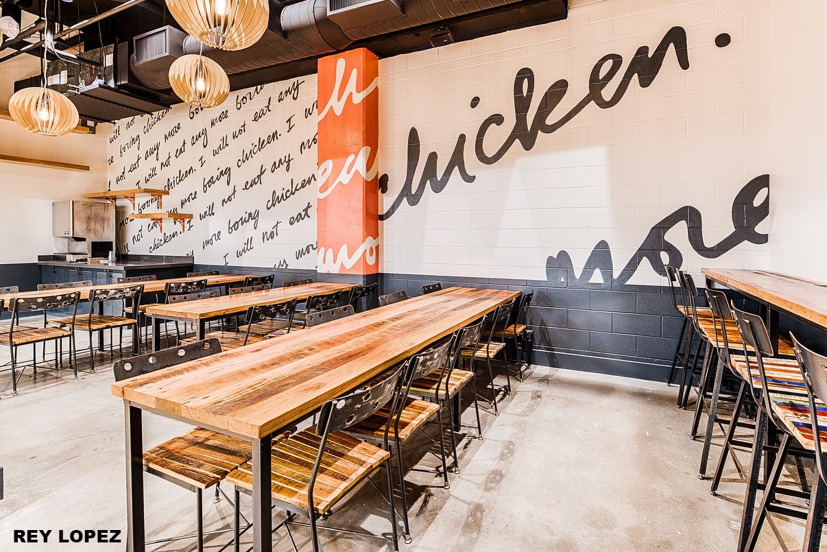 The wall reminds customers they won’t eat boring chicken at Farmbird.