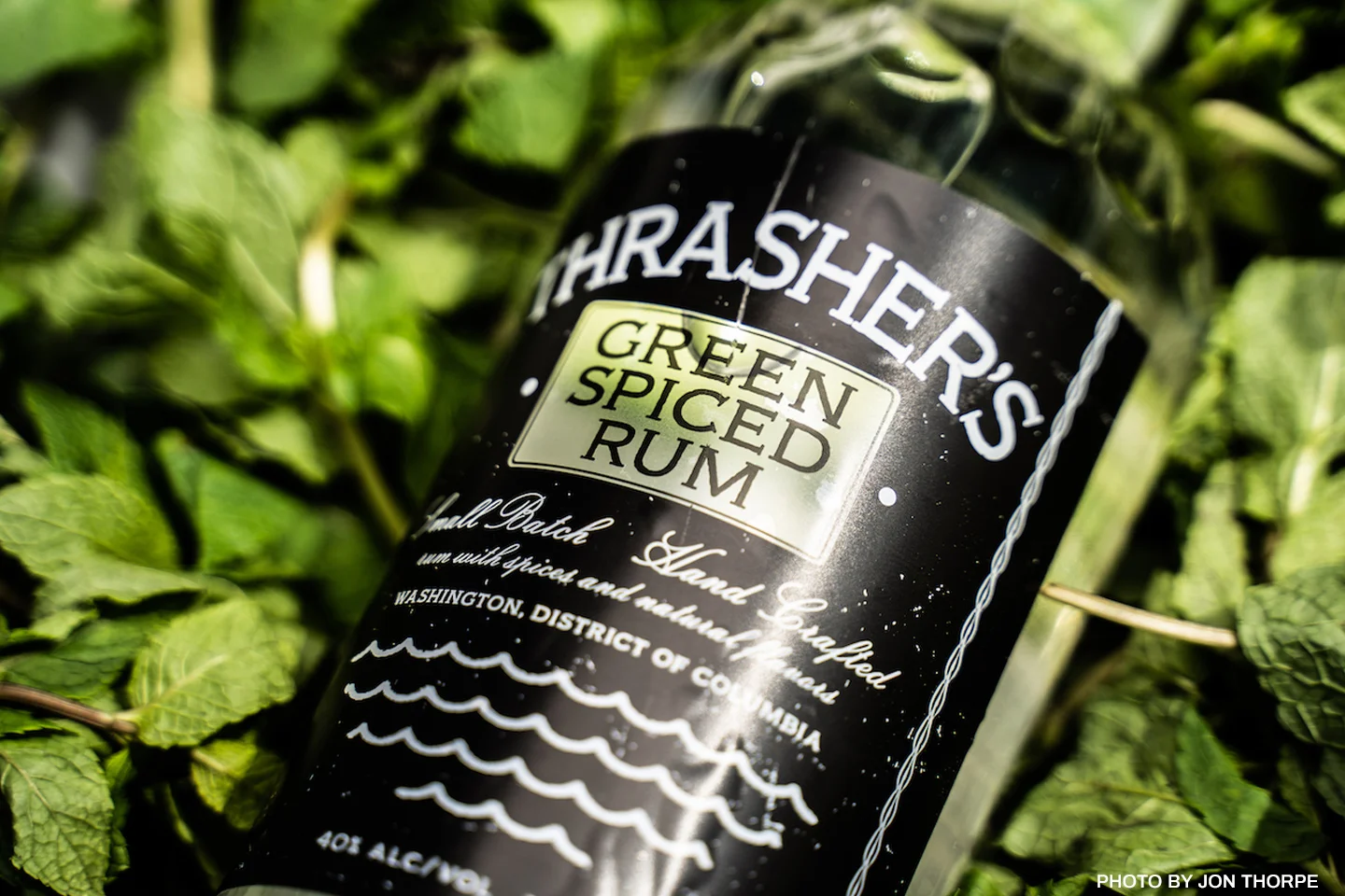 Thrasher’s Green Spiced Rum is made with herbs grown in Todd Thrasher’s backyard, including lemon verbena, lemongrass, lemon balm, mint and green cardamom, he said.