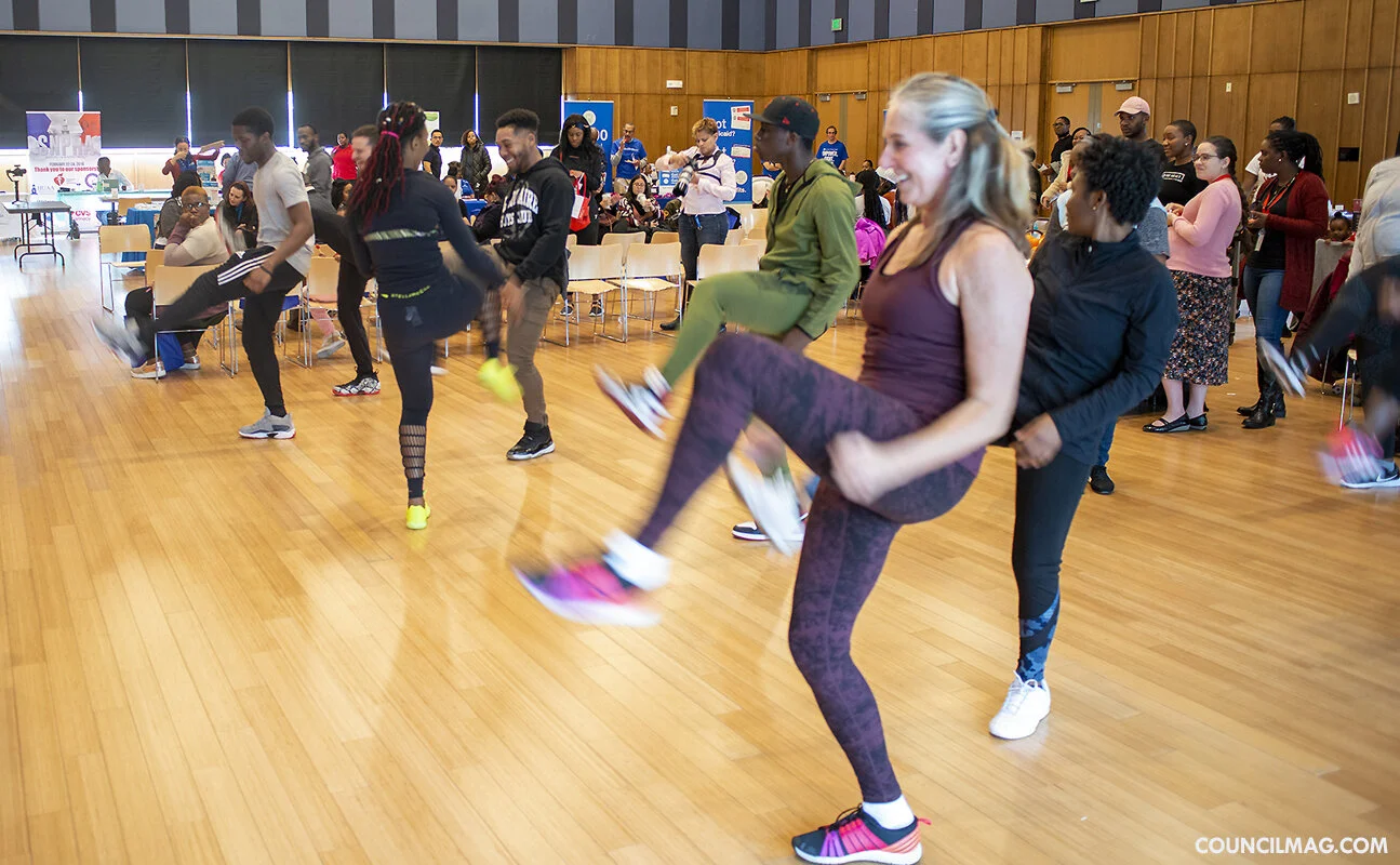 Expo attendees participate in one of many workout demonstrations.