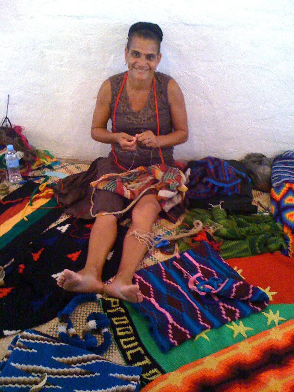 Florence Kamel at Maketi Ples 2011 with the bilum dress that inspired the Happy Talk commission