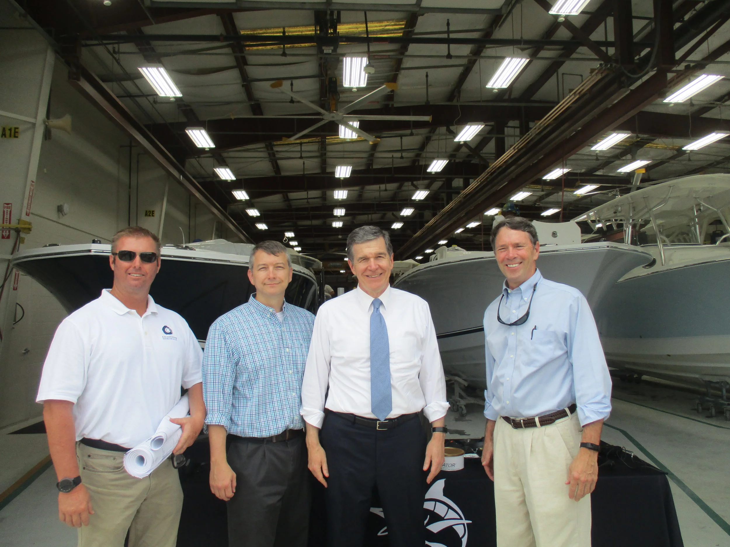 Pictured left to right: Greg Evans, Site Superintendent; Mitchell Ayers, Designer; Governor Roy Cooper; Al Chesson, President of A. R. Chesson Construction.