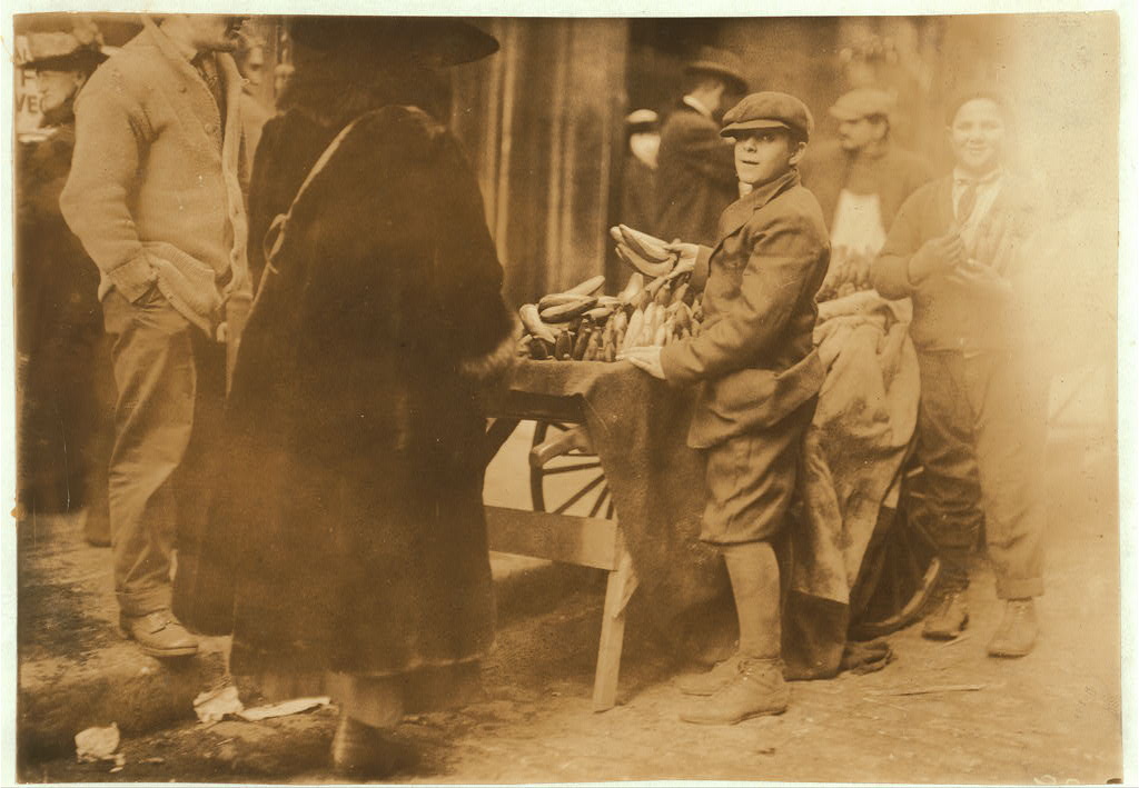 This 1917 photograph by Lewis Hine shows a boy peddling bananas in Boston. Image courtesy Library of Congress.